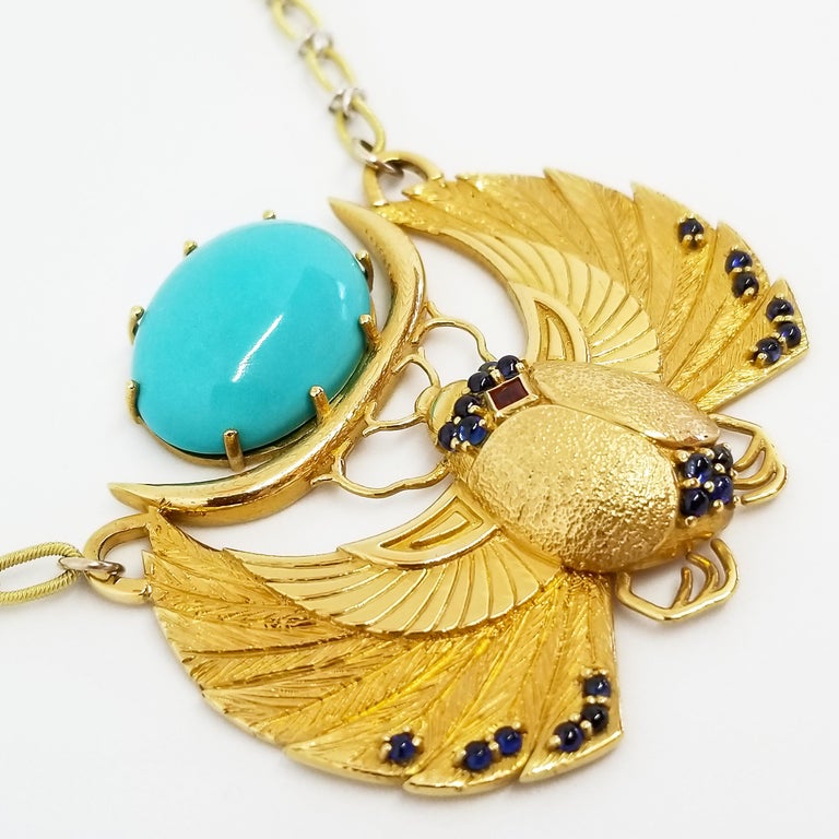 This Custom Designed and Crafted, One of a Kind Statement Necklace by Artisan Tom Castor features a large Winged Scarab as the center piece of this High Design Castor Neck piece. A Unique blend of skilled Egyptian Revival and Contemporary Statement