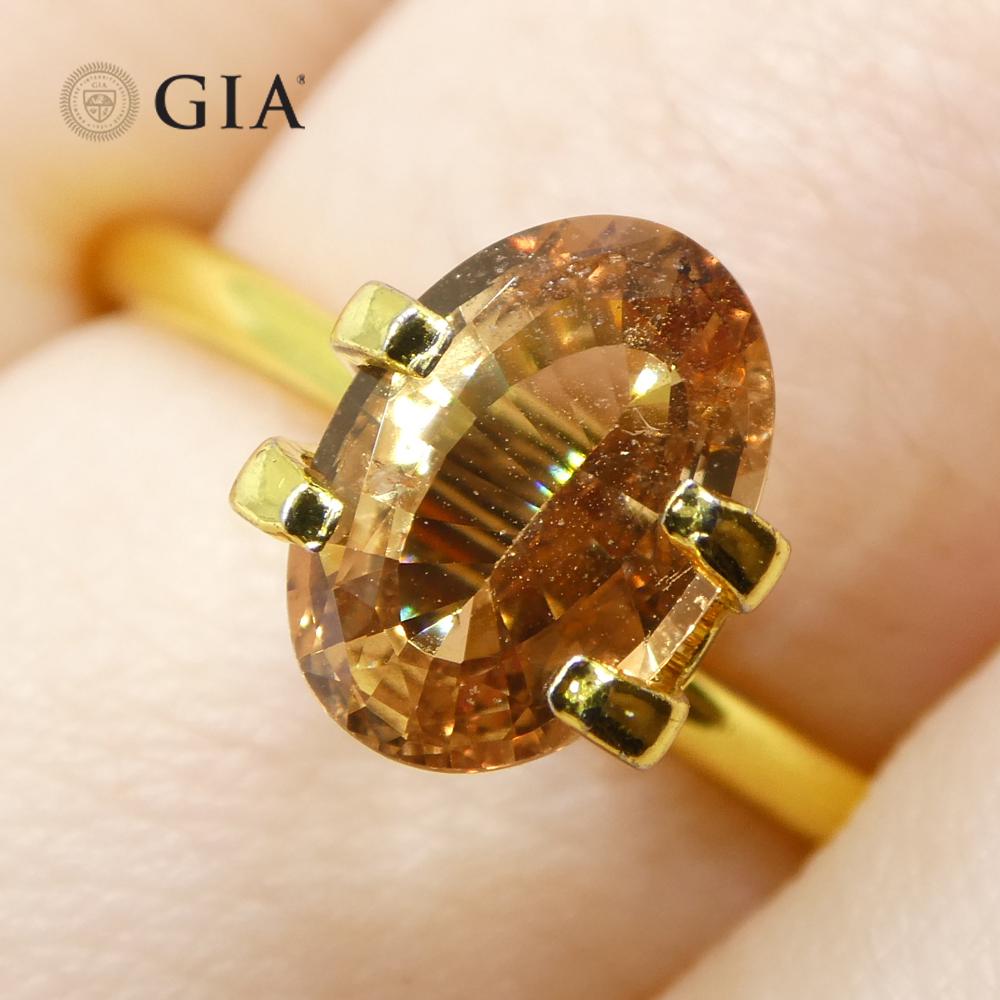 Contemporary 1.65ct Oval Orange Sapphire GIA Certified East Africa Unheated For Sale