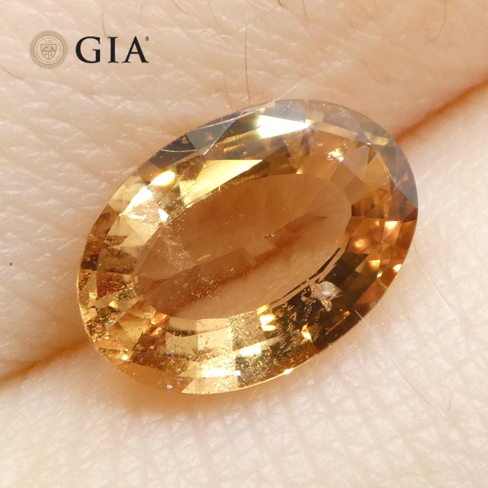 Oval Cut 1.65ct Oval Orange Sapphire GIA Certified East Africa Unheated For Sale