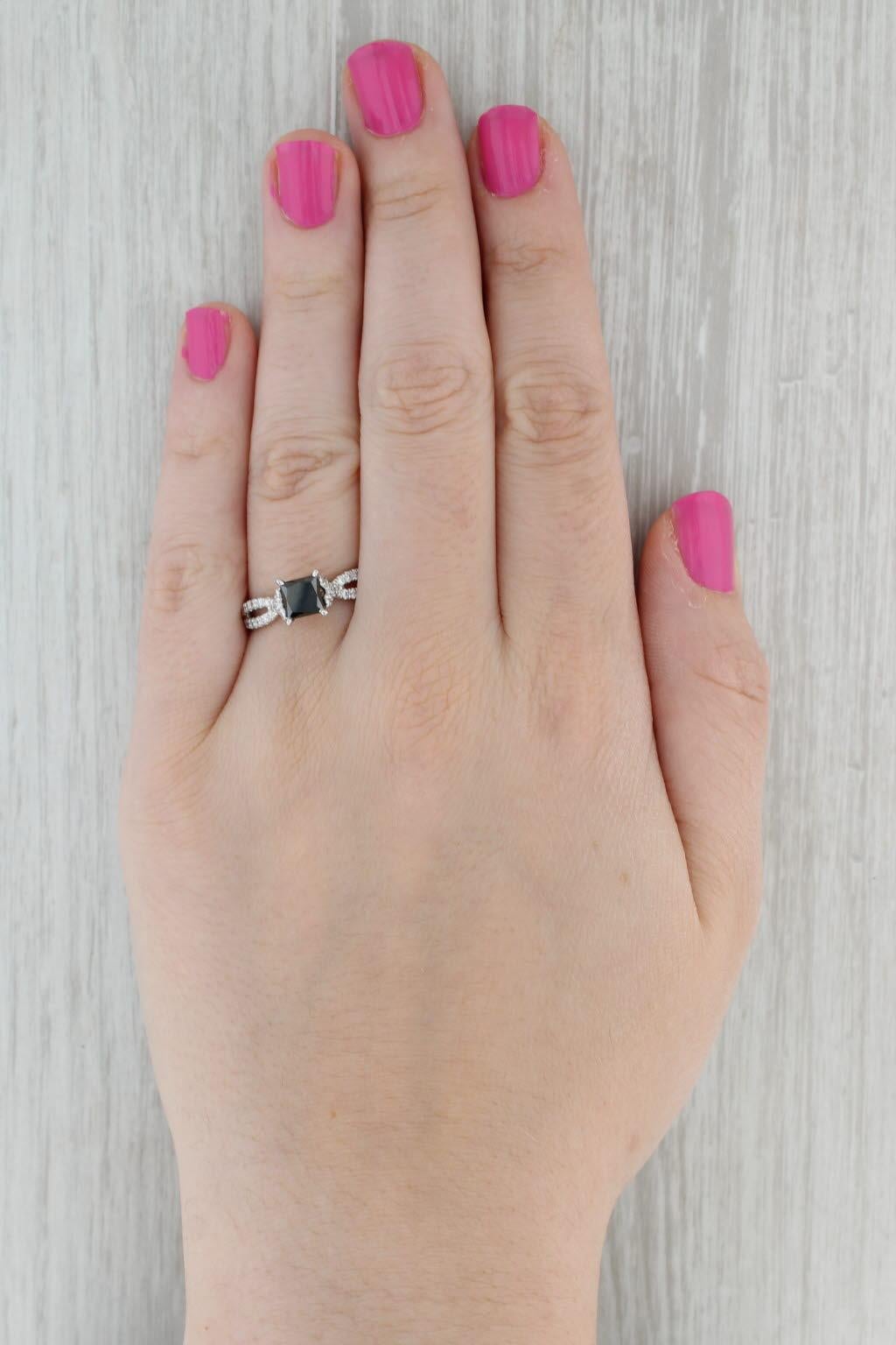 Gemstone Information:
- Natural Diamond -
Carats - 1.27ct 
Cut - Princess
Color - Black
Treatment - Color Treated

- Natural Diamonds -
Total Carats - 0.38ctw
Cut - Round Brilliant
Color - G - H
Clarity - VS2 - SI1

Metal: 14k White Gold
Weight: 3.7