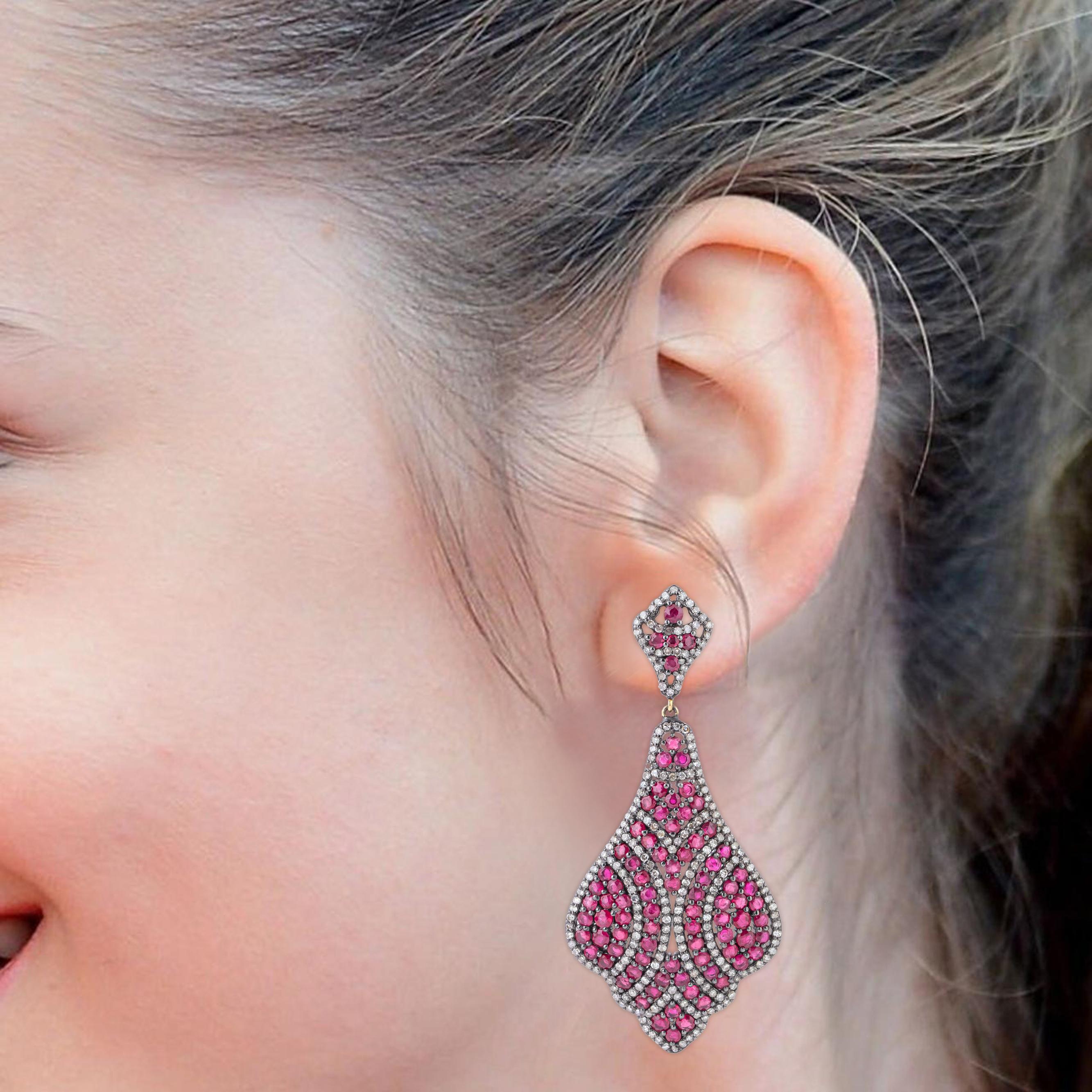 Immerse yourself in the splendor of our 16.6 Carat Diamond and Ruby Cocktail Earrings, an exquisite blend of luxury and artistry. Each pair is uniquely crafted and meticulously curated, making these earrings an extraordinary addition to any jewelry