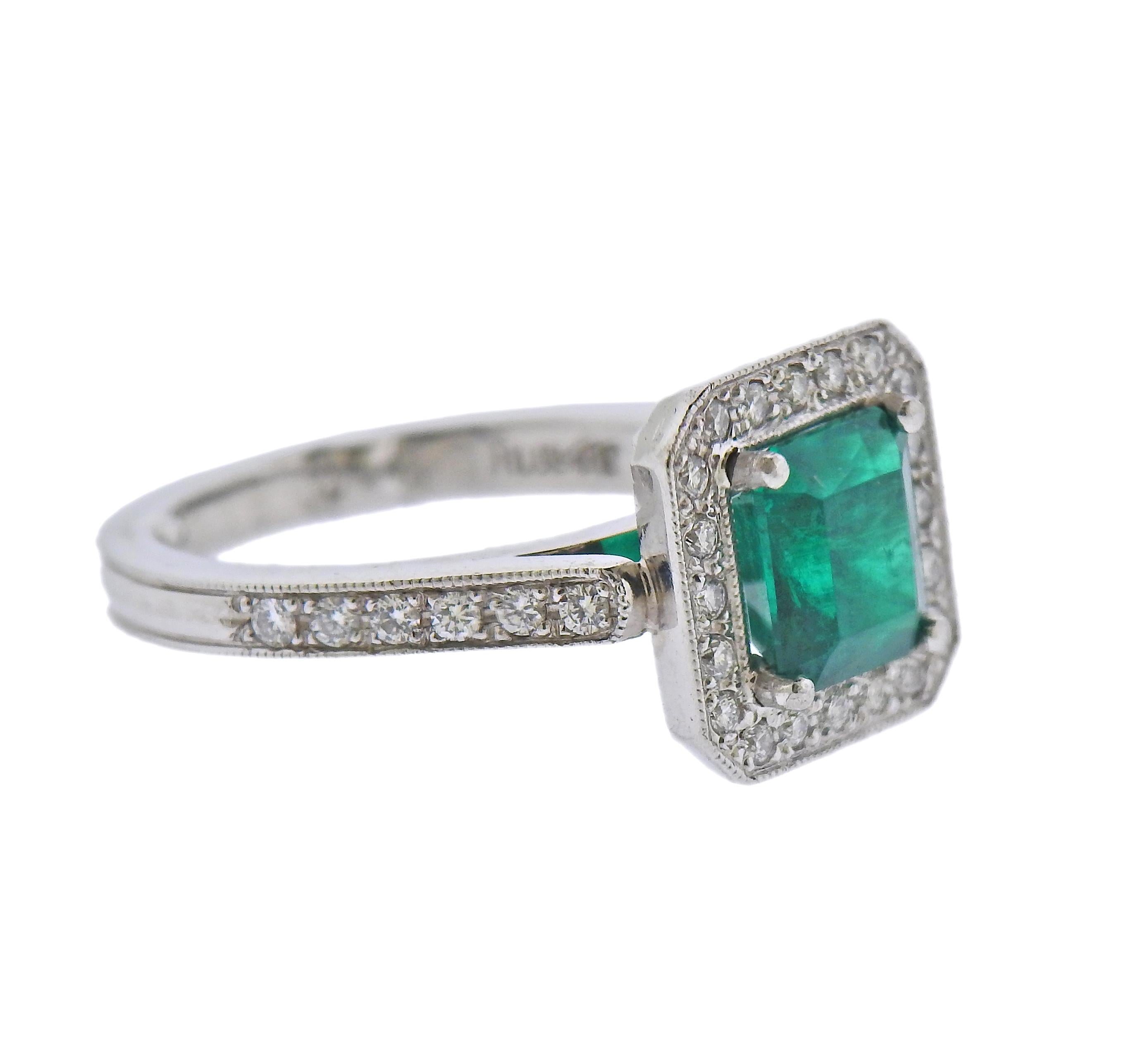Platinum ring, with an approx. 1.66ct emerald (measuring 7.7 x 7.2 x 4.7mm) surrounded with diamonds. Ring size - 6.5, ring top - 13mm x 13mm. Marked: Flush-AT, 850 Plat. Weight - 10.3 grams. 