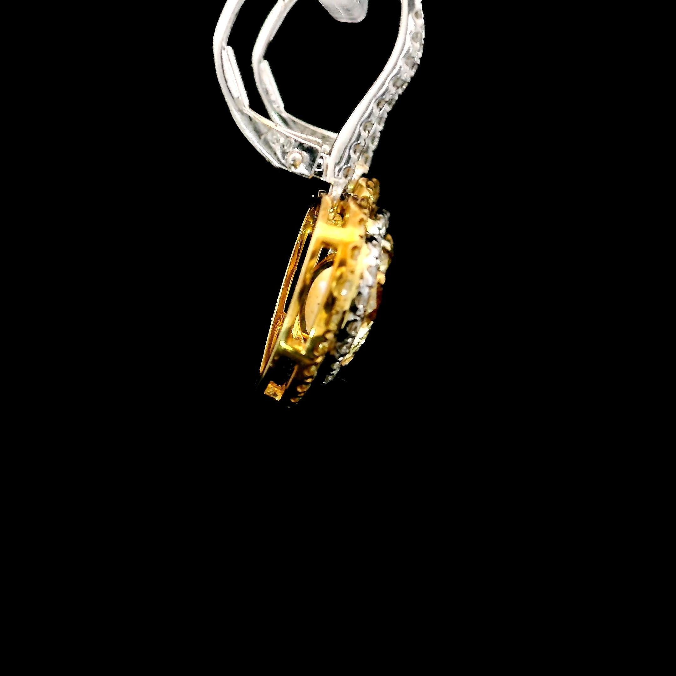 Women's 1.66 Carat Fancy Yellow Diamond Earrings GIA Certified For Sale