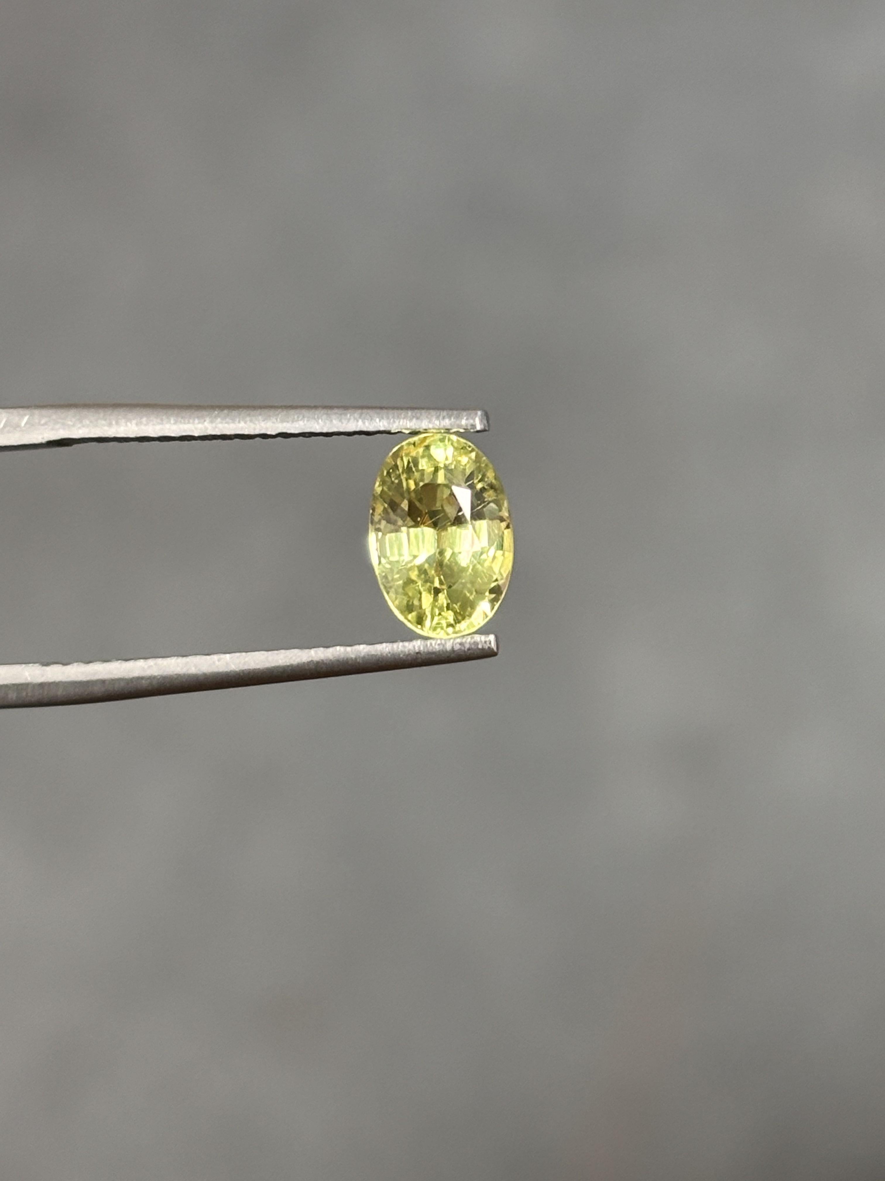 A breathtaking 1.66 Carat Chrysoberyl stone that is a gorgeous shade of yellowish green.  The chrysoberyl hasn't undergone any form of treatment and is completely natural and of good quality. It is cut into perfection in an oval-cut shape.

The