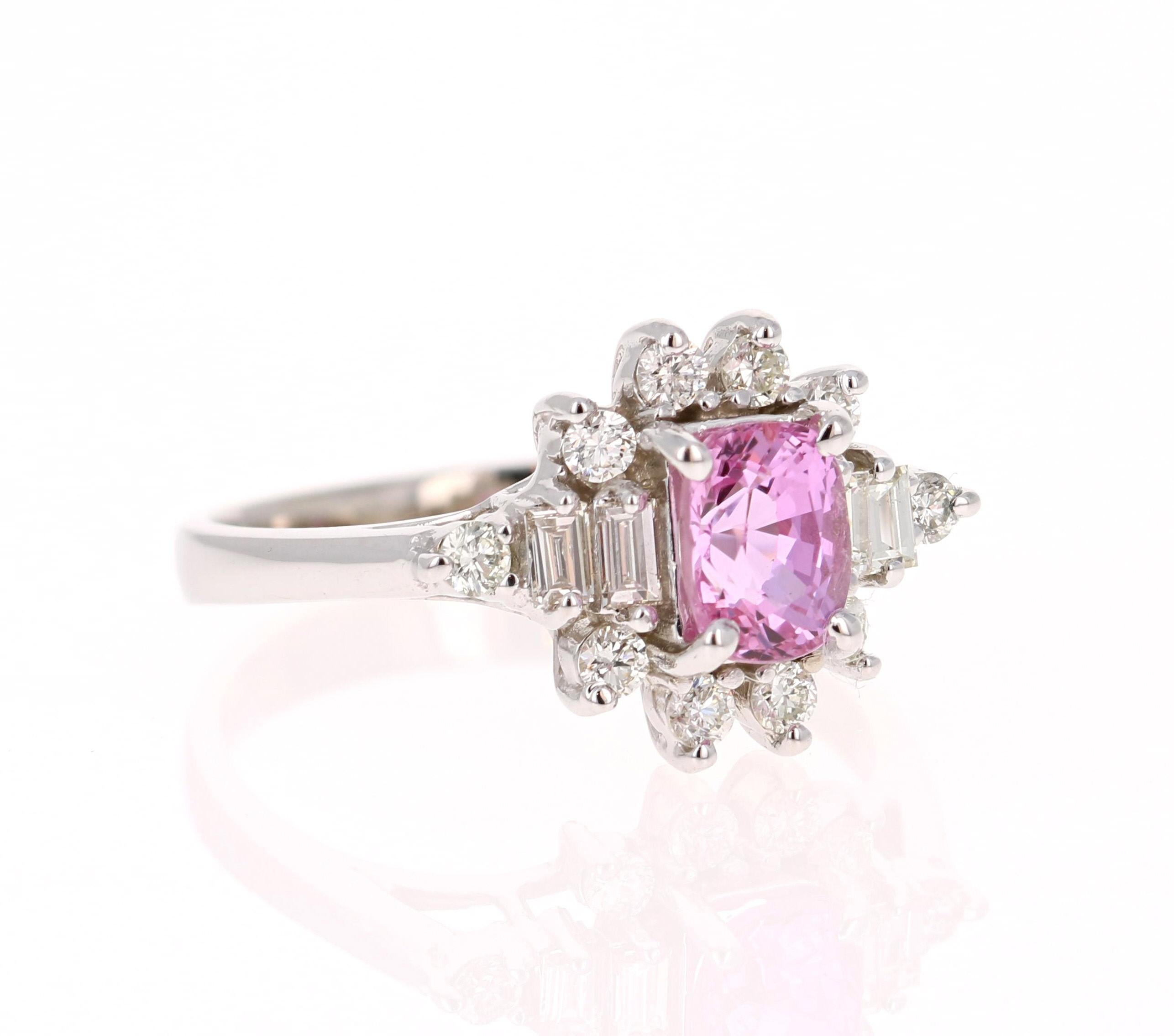 This beautiful ring has a Oval Cut Pink Sapphire that weighs 1.12 Carat. The Pink Sapphire has a beautiful vivid pink color that is rare and valued. The measurements of the sapphire are approximately 7 mm x 5 mm. 
The ring is further embellished