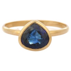 1.66 ct Bezel Set Pear Cut Blue Sapphire Gemstone 18K Yellow Gold Solitaire Ring