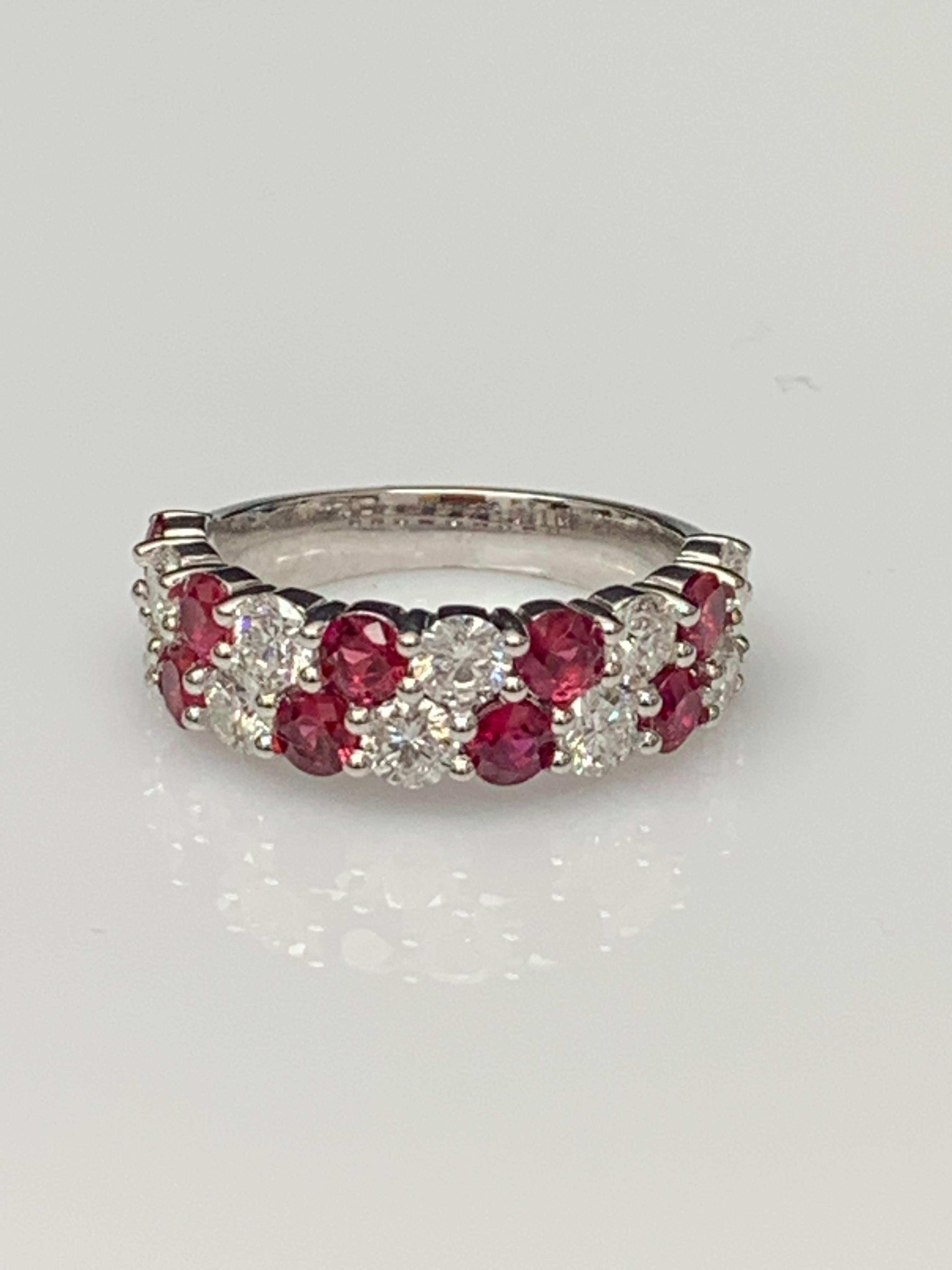 A unique and fashionable ZicZac ring showcasing two rows of round-shape 10 rubies and 9 diamonds, set in a band design. Rubies weigh 1.66 carats and Diamonds weigh 1.52 carats total. A brilliant and masterfully-made piece.

Style available in