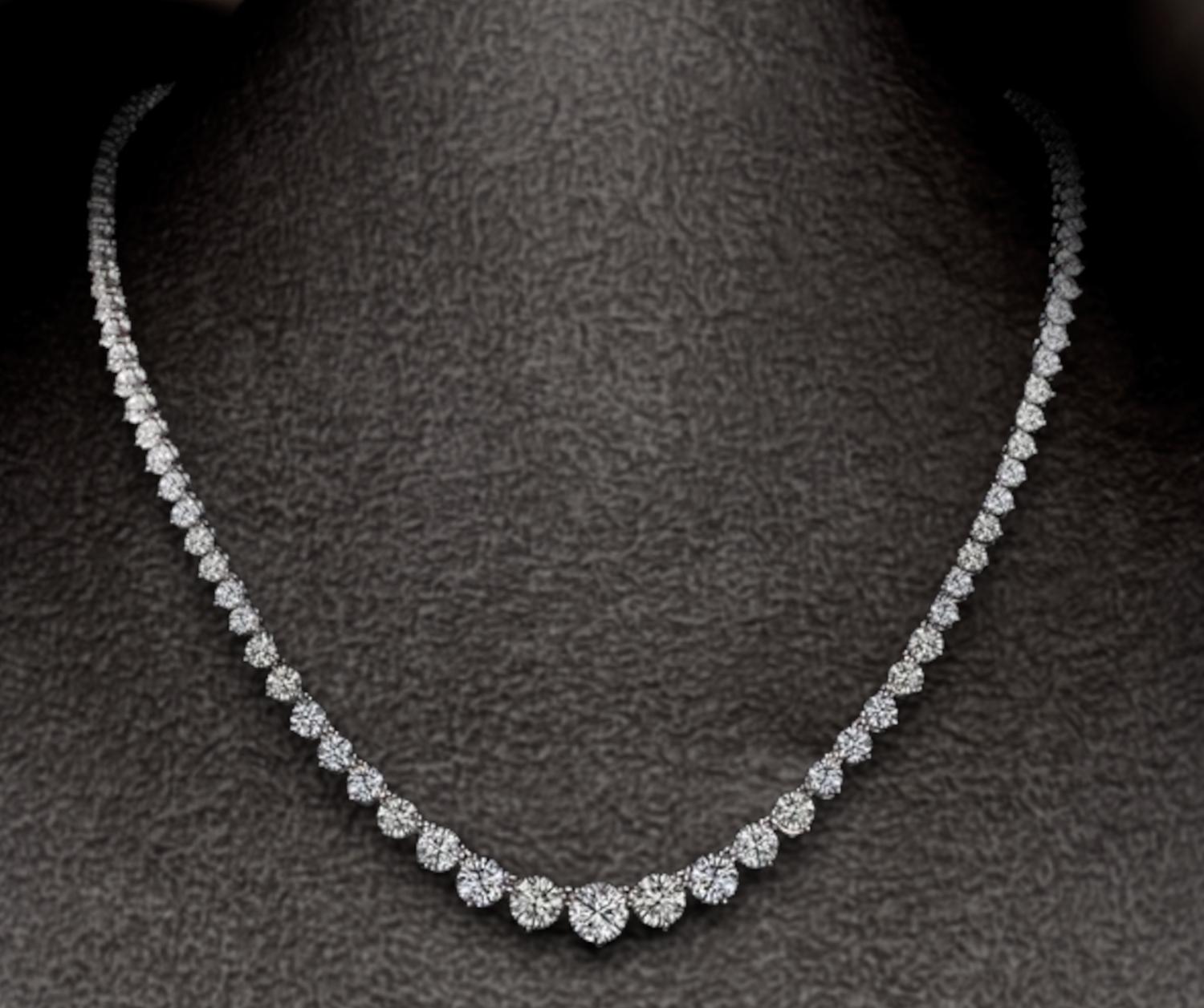 Introducing the Riviera Necklace, a captivating creation that embodies elegance and luxury. This exquisite piece is adorned with 16 carats of graduated diamonds, expertly arranged to create a seamless flow of brilliance around the neck. Spanning 16