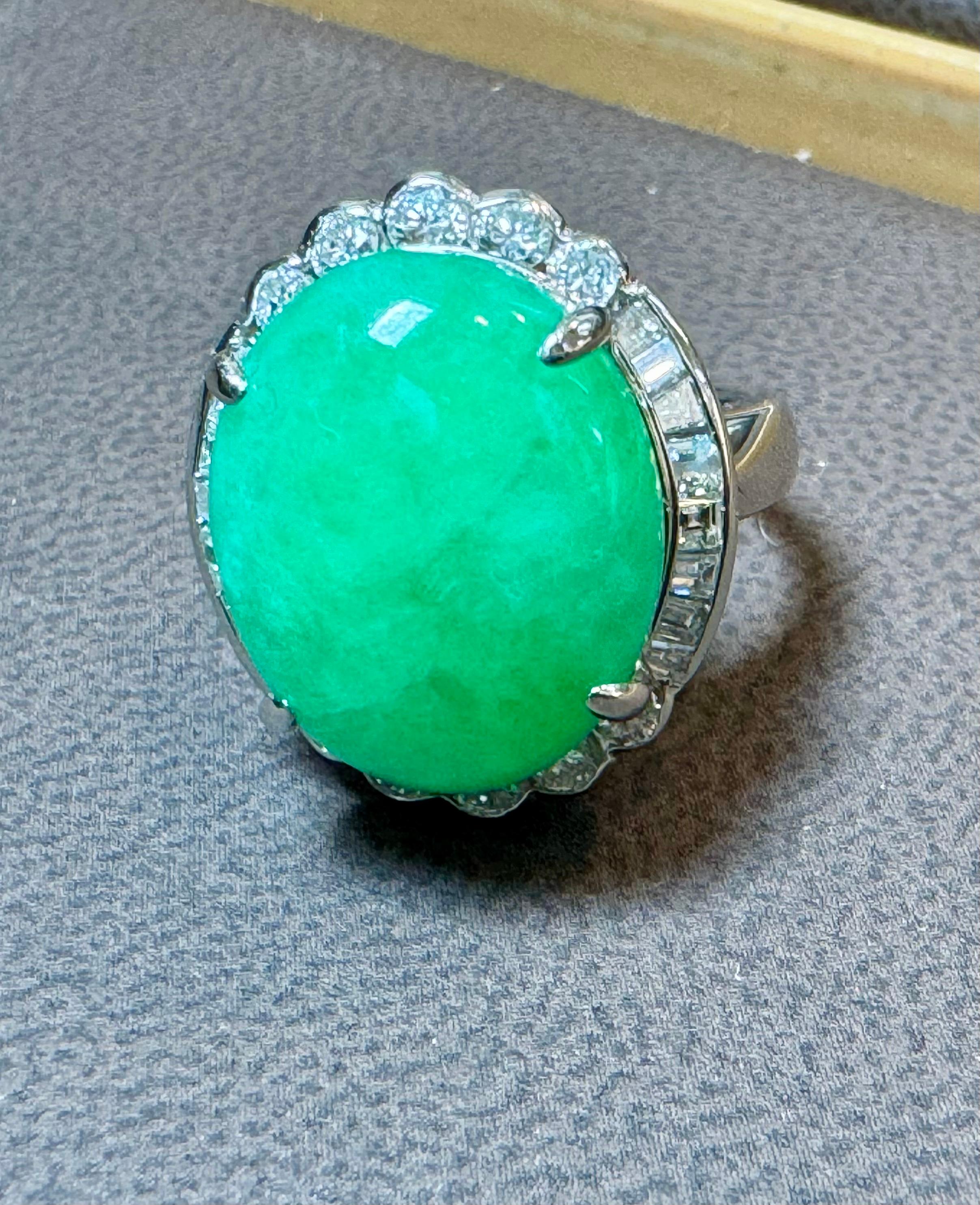16.62 Ct Natural Jadeite Jade & Diamond Cocktail Ring Platinum Size 6.75
This stunning cocktail ring features a 16.6 Ct jadeite jade and diamond, set in Platinum with no treatment. The jadeite jade is known as 