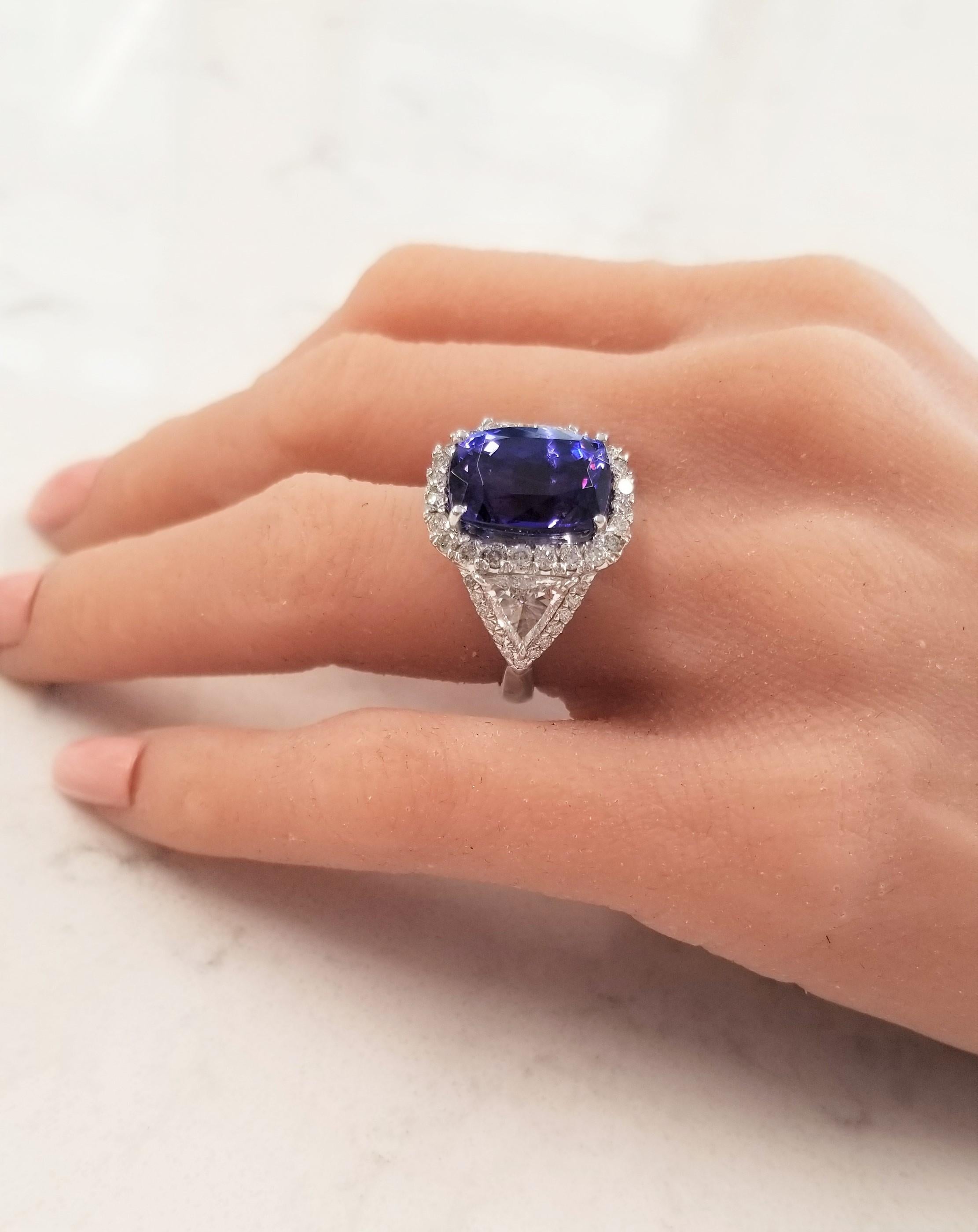 A 16.64 carat tanzanite is the star in this awe-inspiring ring. The gem source is near the foothills of Mt. Kilimanjaro in Tanzania. The intense blue-violet color resembles fine blue sapphire. The saturation is what you want; its transparency and