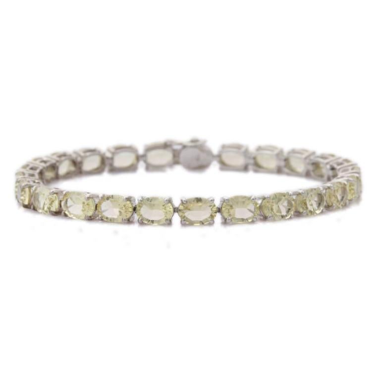 Beautifully handcrafted silver Lemon Topaz Tennis Bracelet, designed with love, including handpicked luxury gemstones for each designer piece. Grab the spotlight with this exquisitely crafted piece. Inlaid with natural lemon topaz gemstones, this