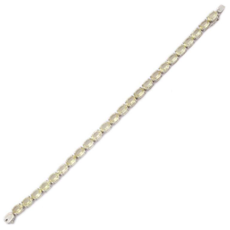 Oval Cut 16.66 Carat Lemon Topaz Gemstone Tennis Bracelet for Women in .925 Silver For Sale