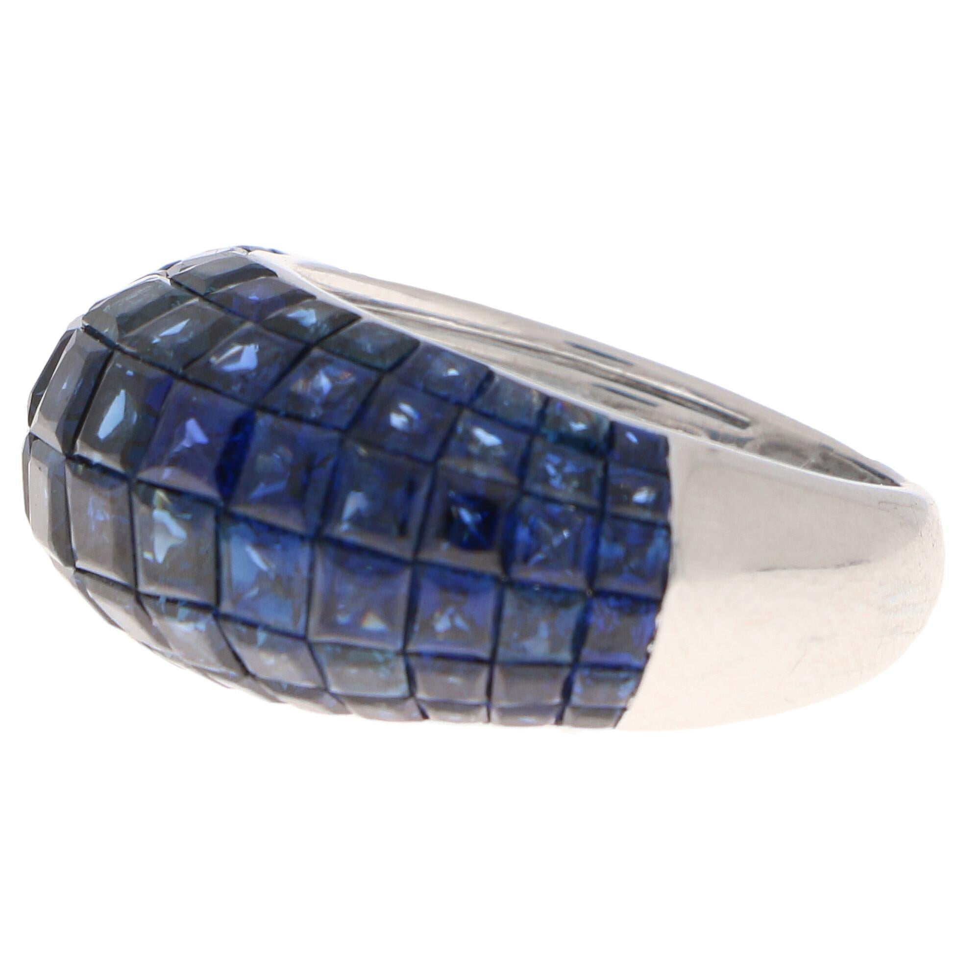 Modern 16.69 Carat Invisibly Set Blue Sapphire Bombe Cocktail Ring Set in 18 Karat Gold