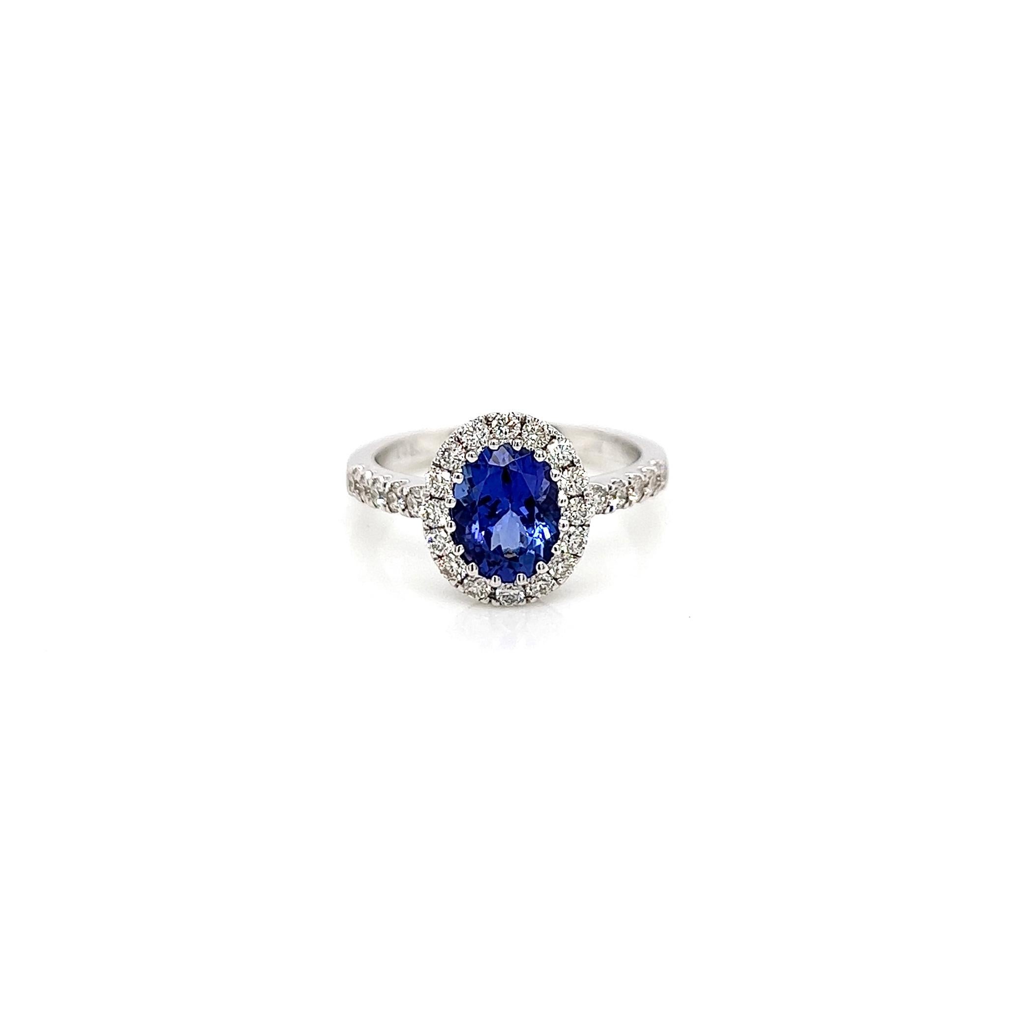 2.21 Total Carat Tanzanite Diamond Ladies Ring

Looking for a fabulous tanzanite diamond ring? Then you have definitely come to the right place. Tanzanite diamond ring with classic halo design will look fabulous on any woman.
Gleaming stones are set