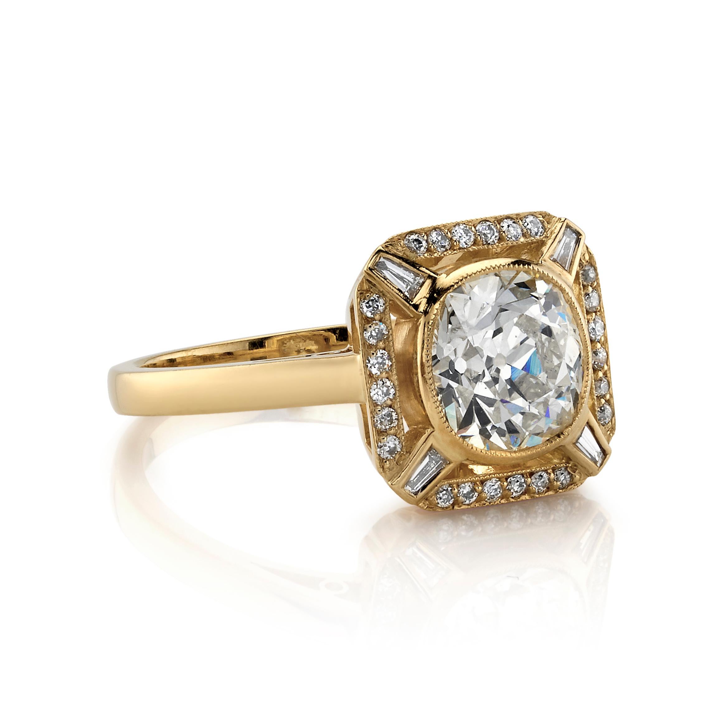 1.66ct K/SI1 EGL certified Cushion cut diamond with 0.19ctw accent diamonds set in a handcrafted 18k yellow gold ring. 

Ring is currently a size 6 and can be sized to fit.