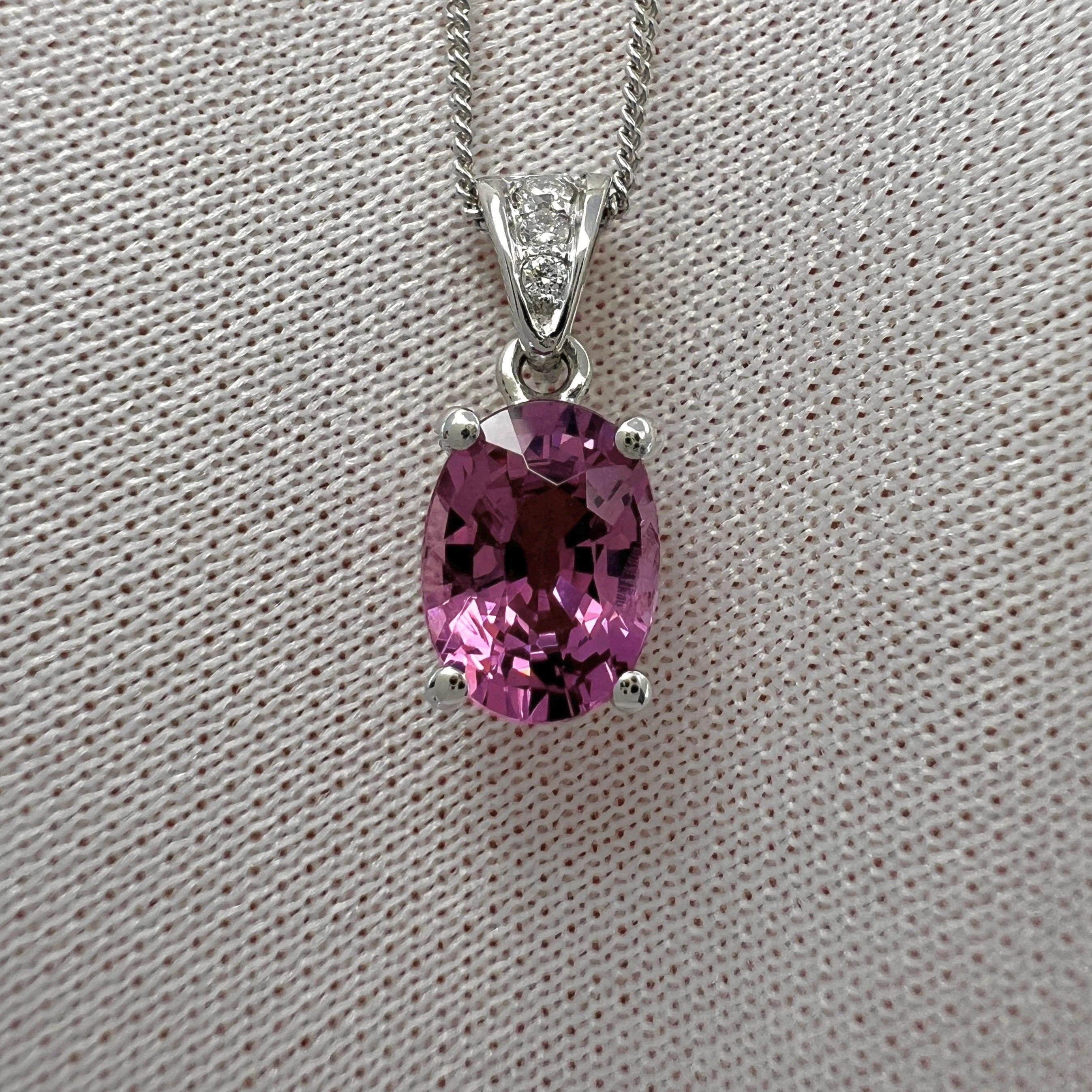 Natural Vivid Pink Rubellite Tourmaline & Diamond 950 Platinum Pendant Necklace. 

1.66 Carat rubellite tourmaline with a beautiful vivid pink colour, excellent clarity and an excellent oval cut.
Set in a fine 950 platinum solitaire pendant with