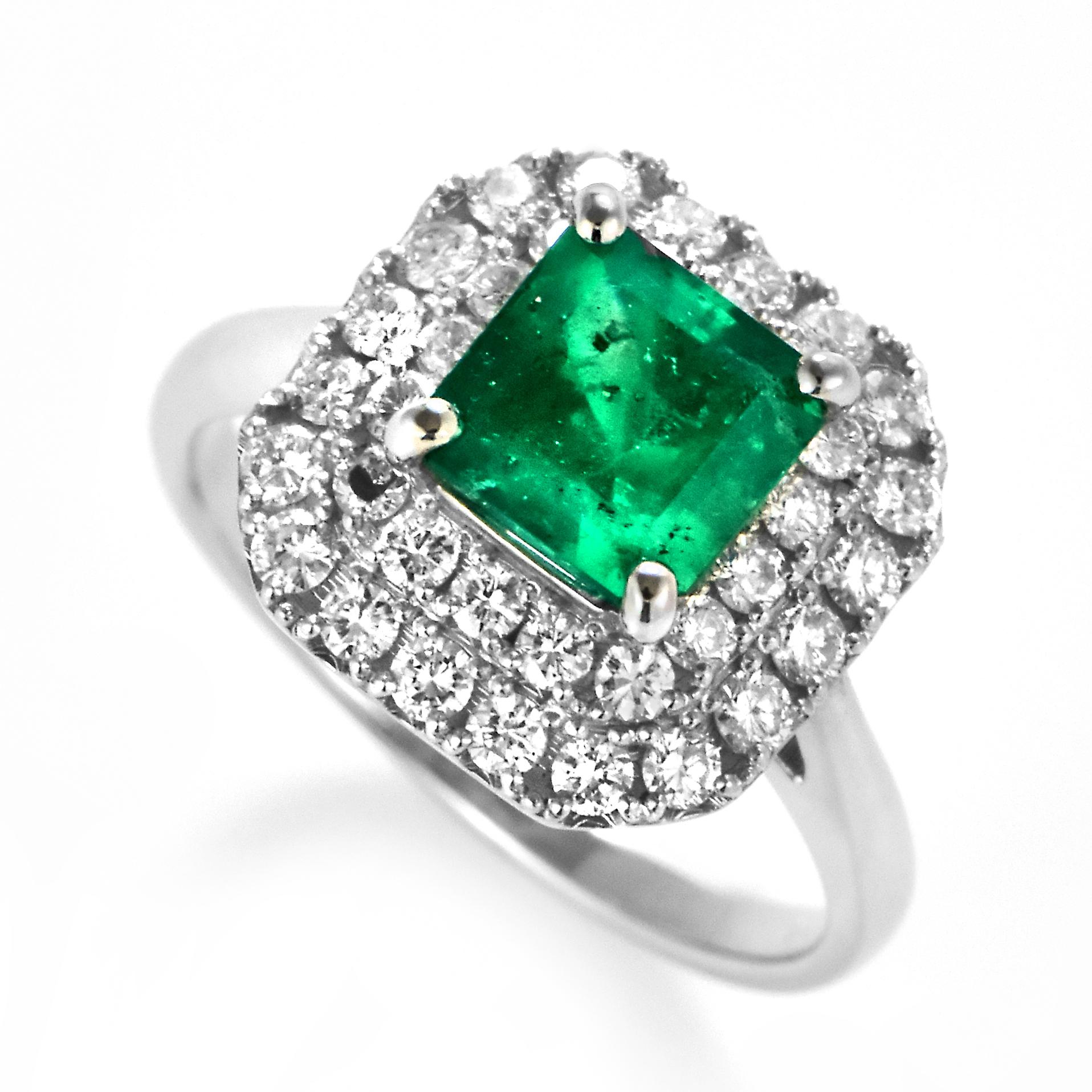 A stunning ring featuring a 1.674 Carat Natural Colombian, Muzo-Green Emerald and 0.70 Carats of Diamond Accents set in Platinum. People have admired emerald’s green for thousands of years. Emeralds have always been associated with the lushest