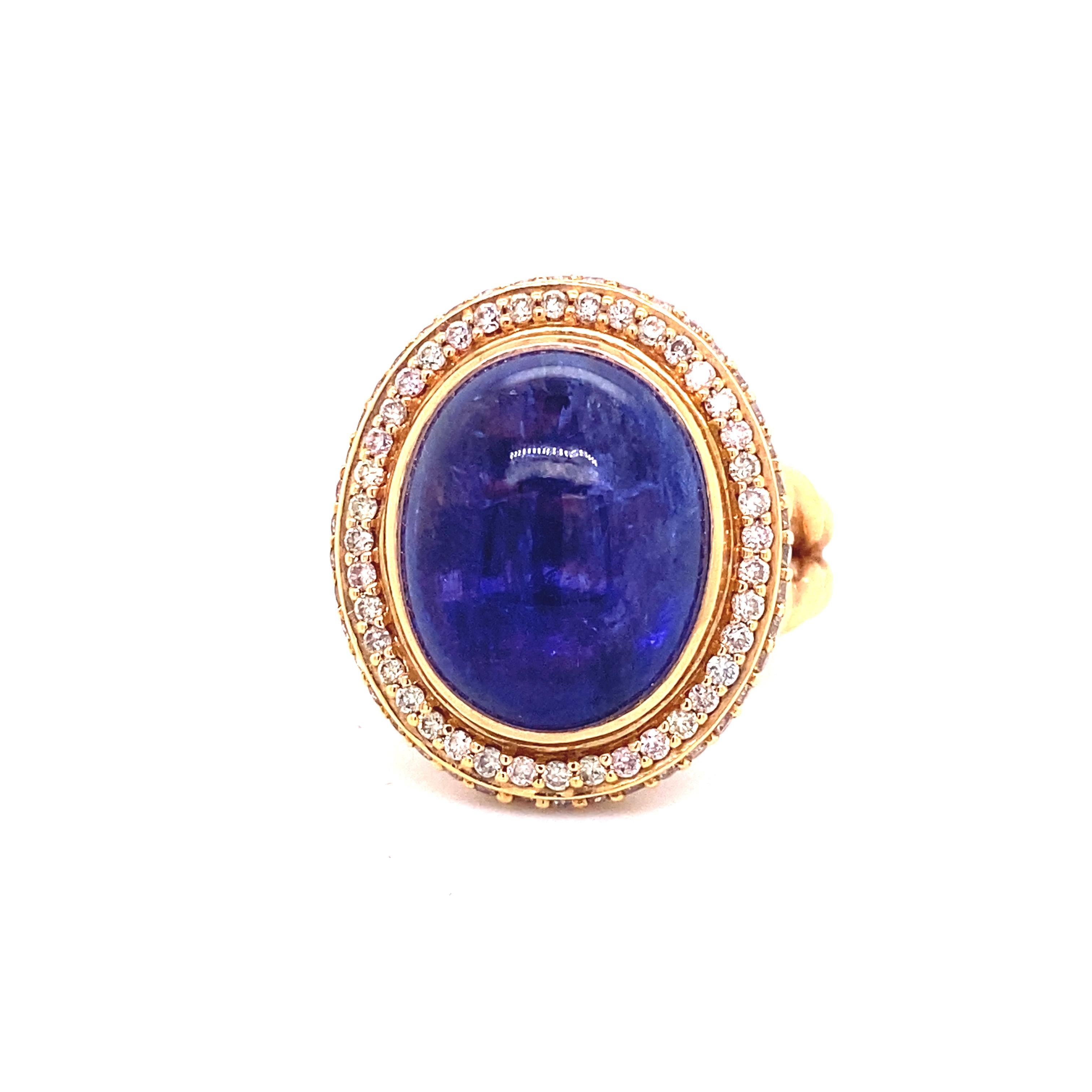 Large Tanzanite Cabochon Ring in 18 Karat Rose Gold and Diamonds

This magnificent cocktail ring showcases a beautiful 16.7 carat Tanzanite cabochon richly vivid in violet-bluish hues. Tanzanite is relatively new to the colored stone galaxy. The