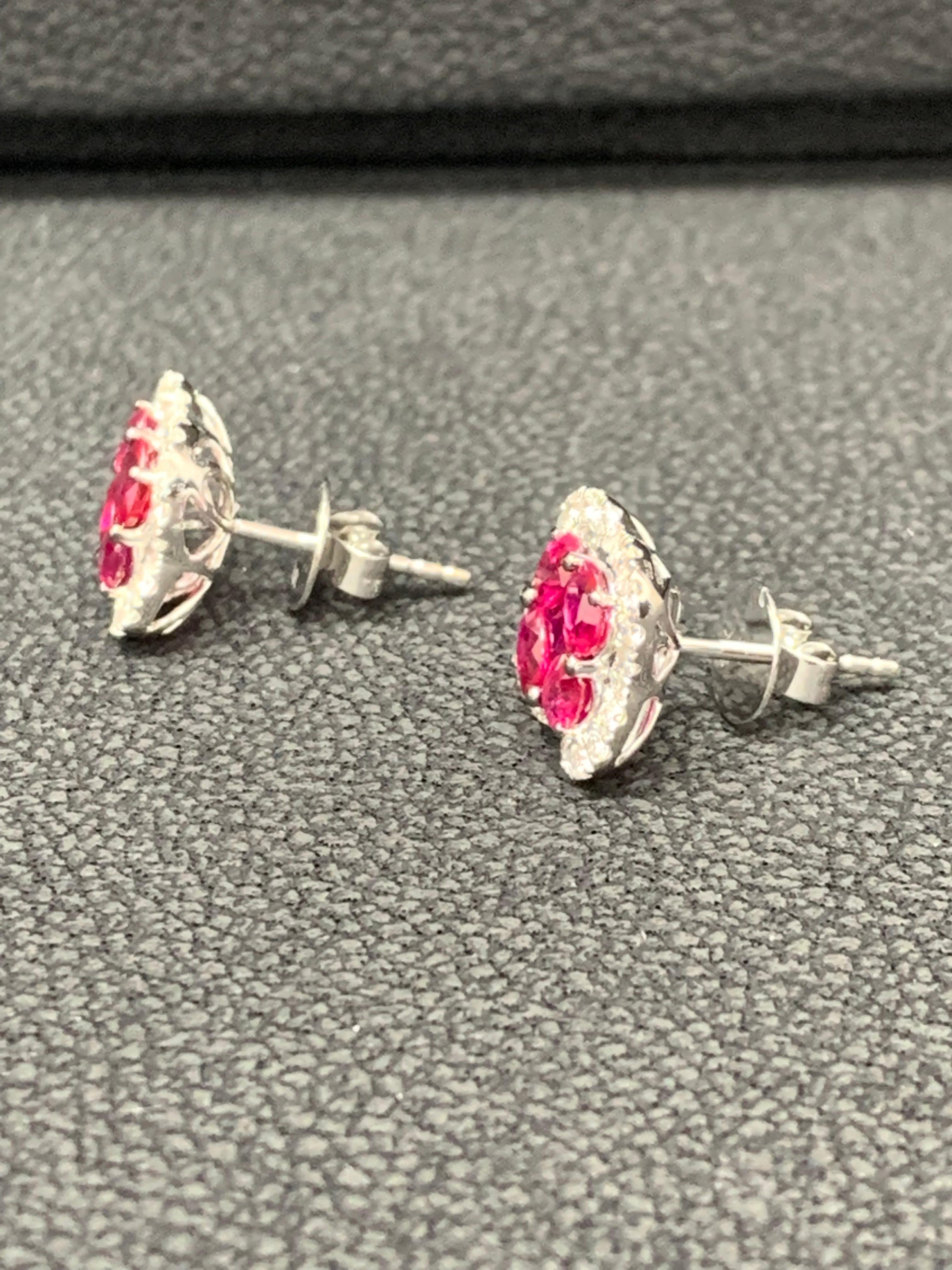 1.67 Carat Oval cut Ruby and Diamond Stud Earrings in 18K White Gold In New Condition For Sale In NEW YORK, NY
