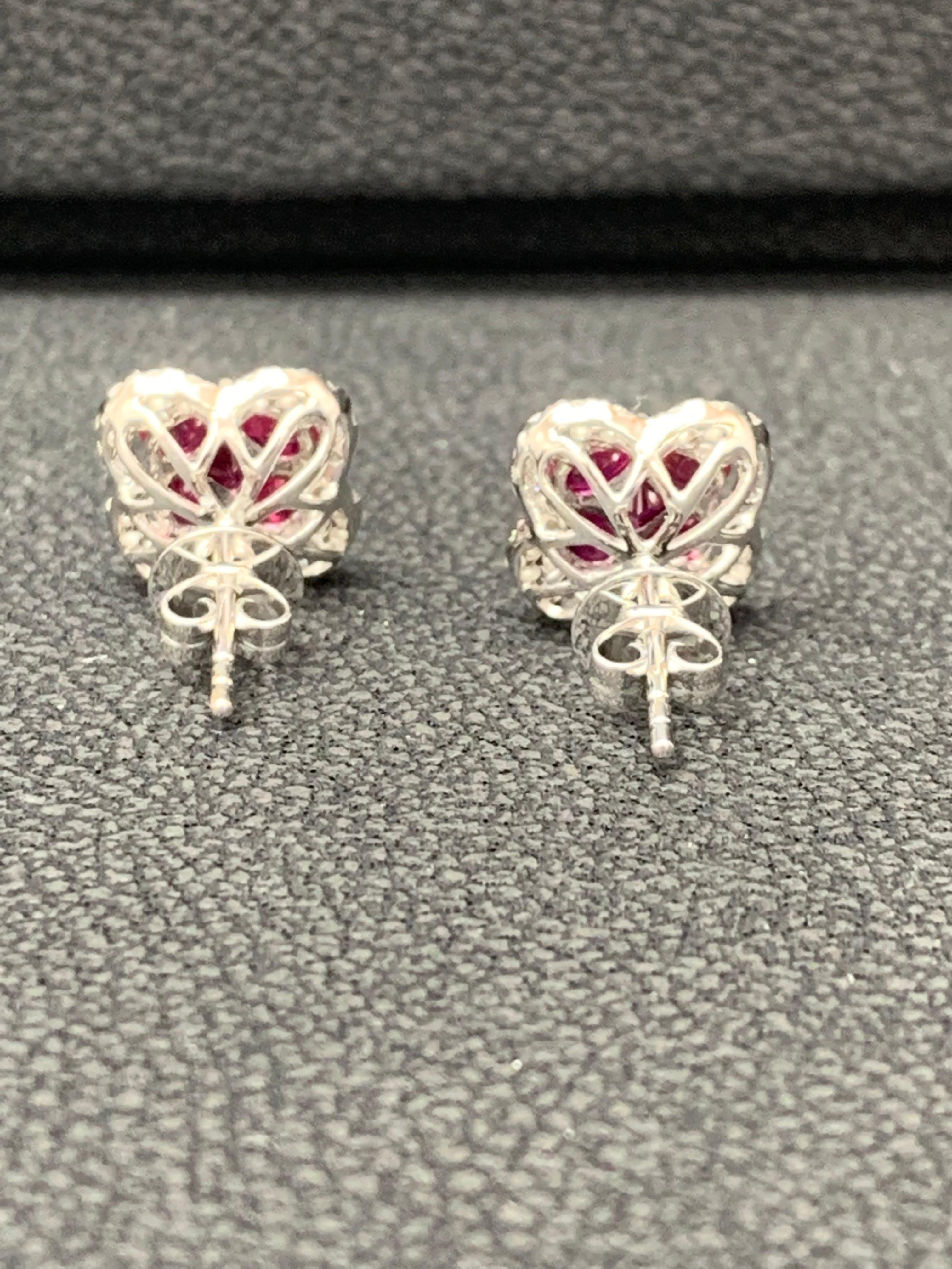 Women's 1.67 Carat Oval cut Ruby and Diamond Stud Earrings in 18K White Gold For Sale