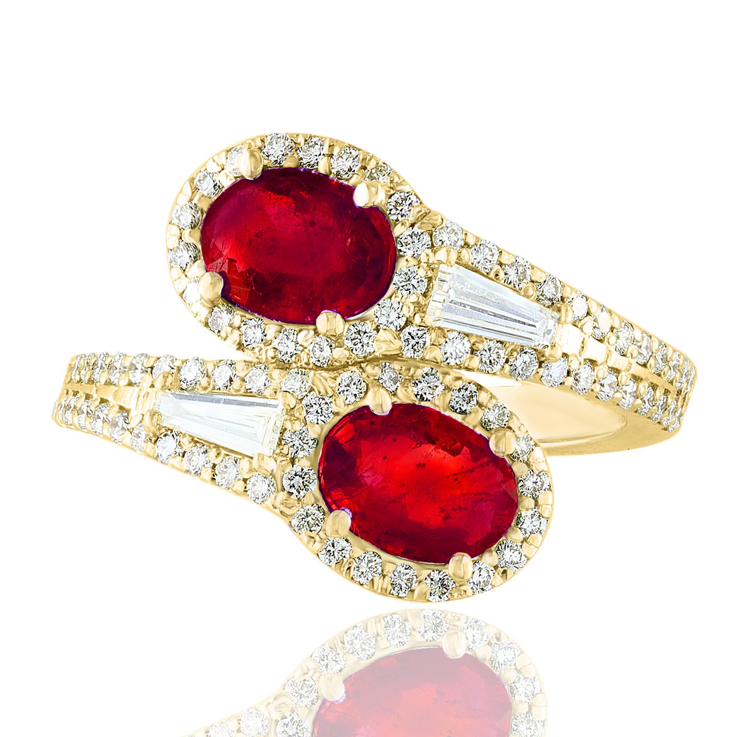 The stunning forever-together Toi et Moi ring features 2 Oval cut Rubies embraced by east to west 2 baguette diamonds weigh and 84 round diamonds halfway to the shank. Handcrafted in 14k Yellow Gold.
2 oval Rubies in the center weigh 1.67 carats and
