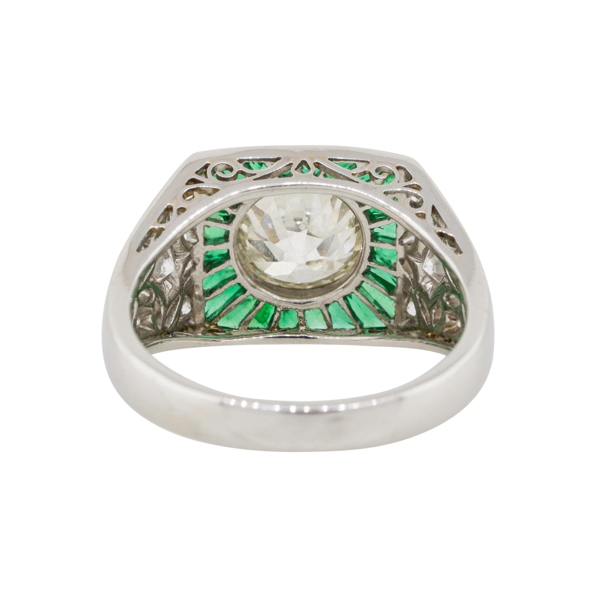 1.67 Carat Round Diamond Center Wide Ring with Emeralds Platinum in Stock In New Condition In Boca Raton, FL