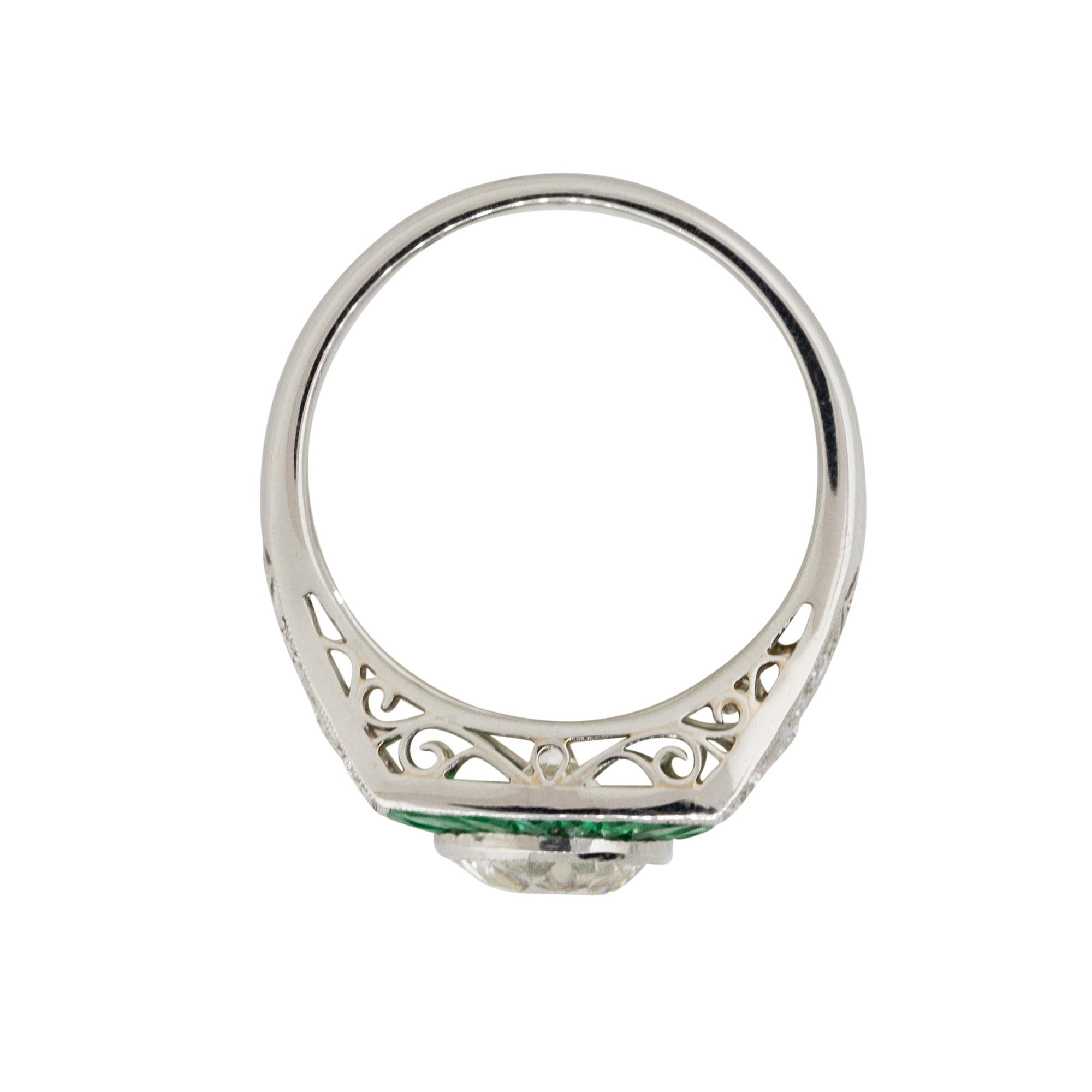 Women's 1.67 Carat Round Diamond Center Wide Ring with Emeralds Platinum in Stock