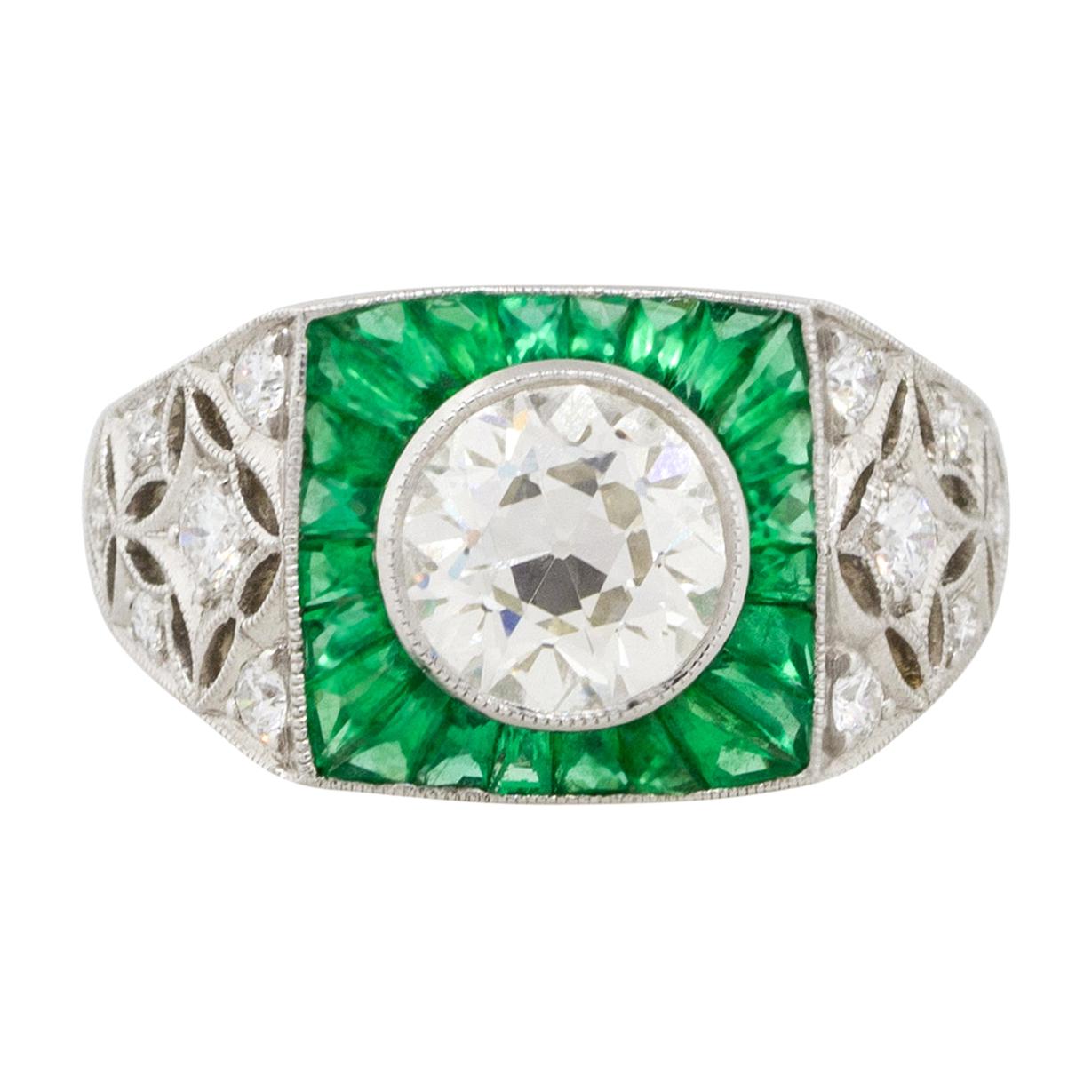 1.67 Carat Round Diamond Center Wide Ring with Emeralds Platinum in Stock