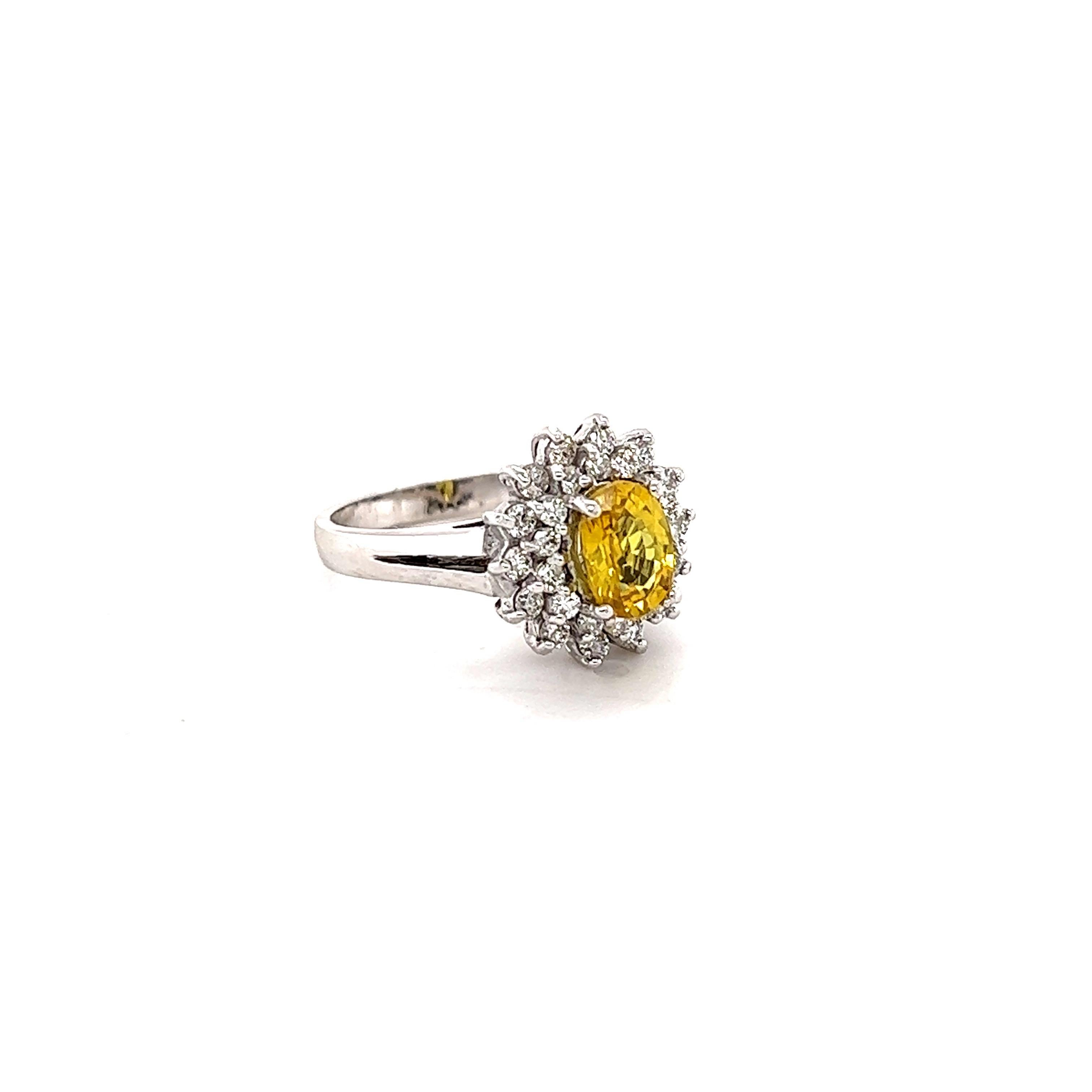 This beautiful ring has a Natural Oval Cut Heated Yellow Sapphire that weights 1.16 Carats. The Yellow Sapphire measures at 7 mm x 5 mm. 

The ring is embellished with 28 Round Cut Diamonds that weigh 0.51 Carats with a clarity and color of SI-F.
