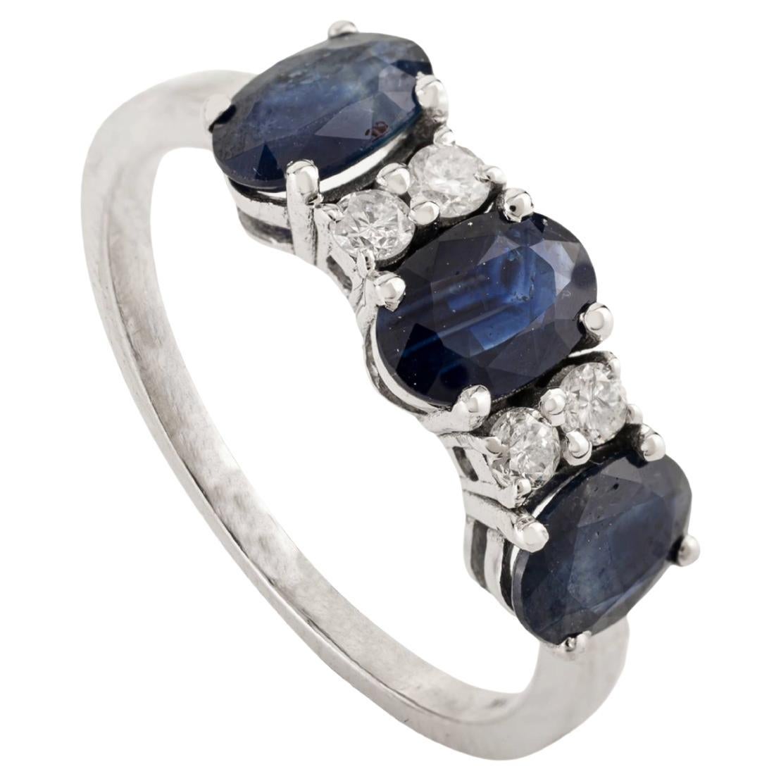 For Sale:  1.67 Ct Blue Sapphire 
Diamond Three-Stone Ring in 18K White Gold Fine Jewelry