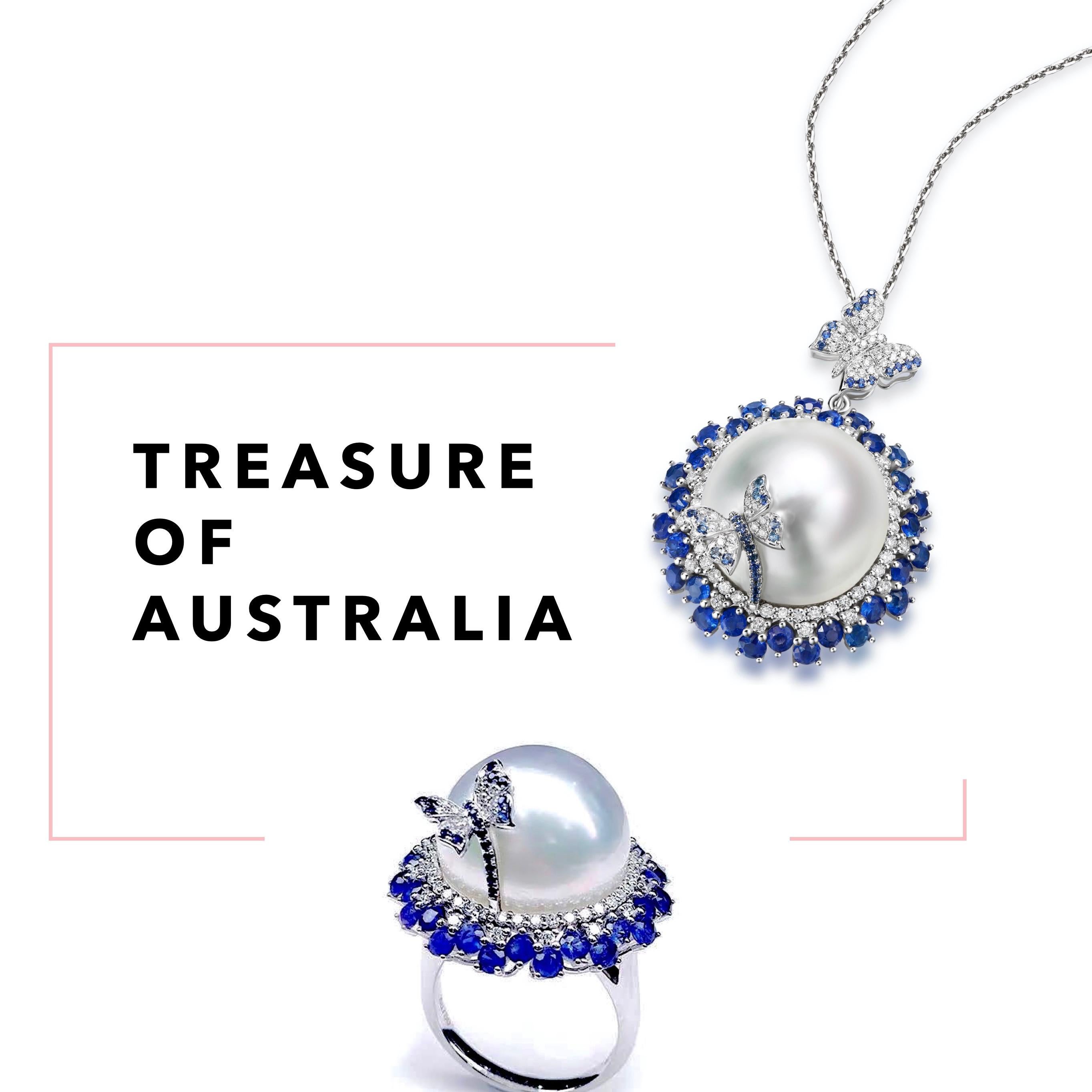The design is inspired by butterfly resting on top of a flower. The massive 16.7 mm White Australian South Sea Pearl is surrounded by vivid blue sapphire pave. On top the the pearl is a butterfly encrusted in vivid blue sapphire and diamonds. The