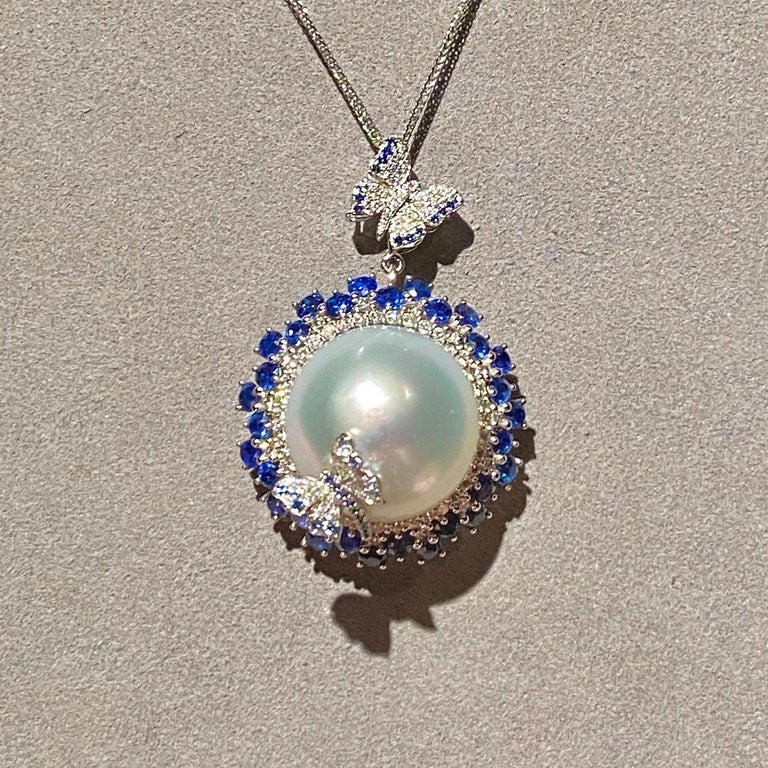 Contemporary South Sea Pearl, Blue Sapphire and Diamond Pendant in 18k Gold For Sale