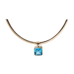 16.70ct Flawless Blue Topaz Pendant Set on an Omega Chain, 14k Yellow Gold