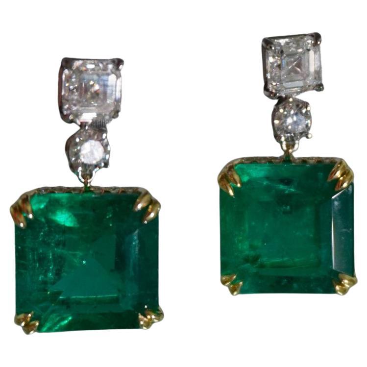 Emerald Weight: 16.72 ct
Diamond Weight: 3.12 ct 
Metal: Platinum/18K Yellow Gold
Gold Weight: 6.89 gm
Shape: Emerald-cut
Color: Intense Green
Hardness: 7.5-8
Birthstone: May