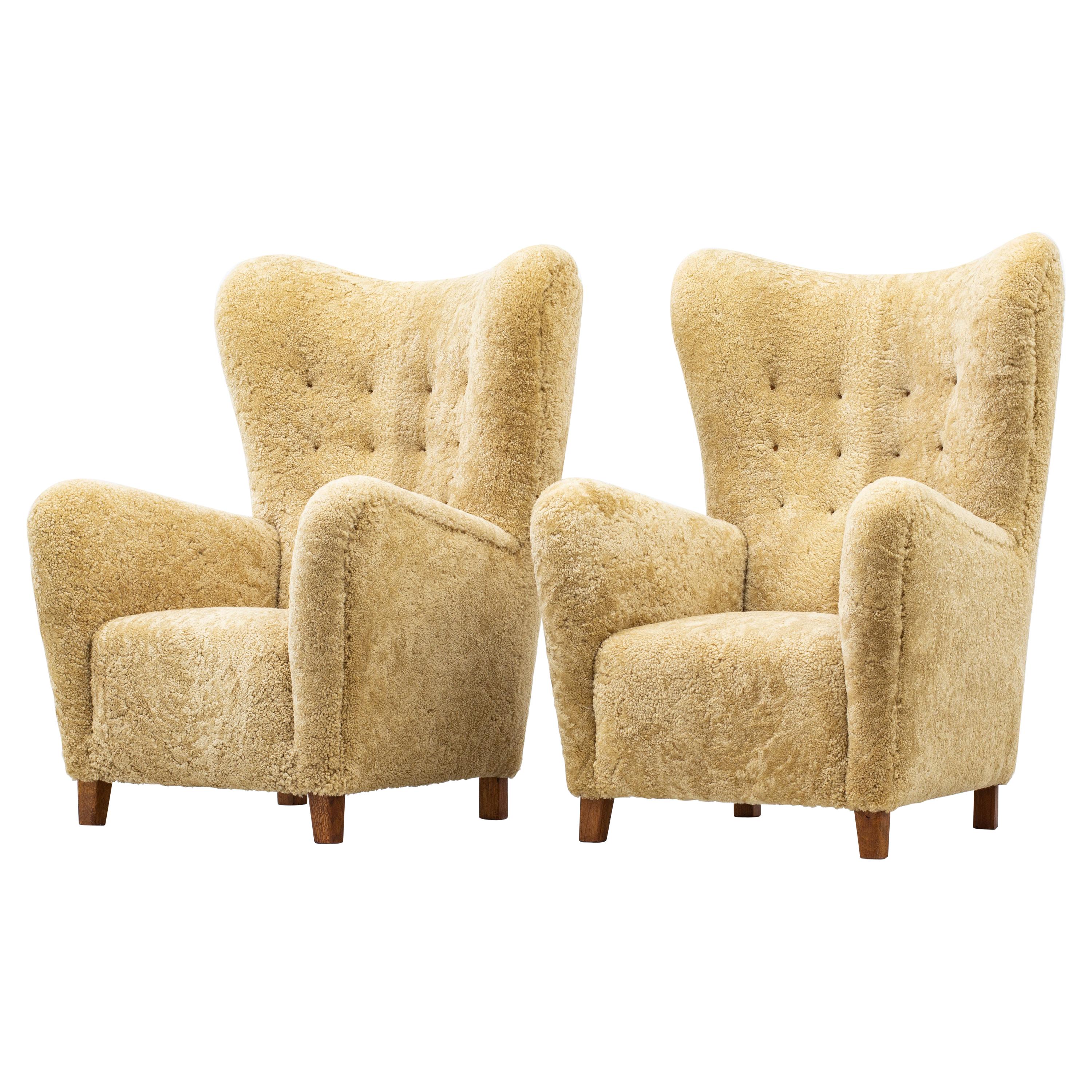 "1672" Wingback Chairs by Fritz Hansen, with Sheep Skin, Denmark, 1940s