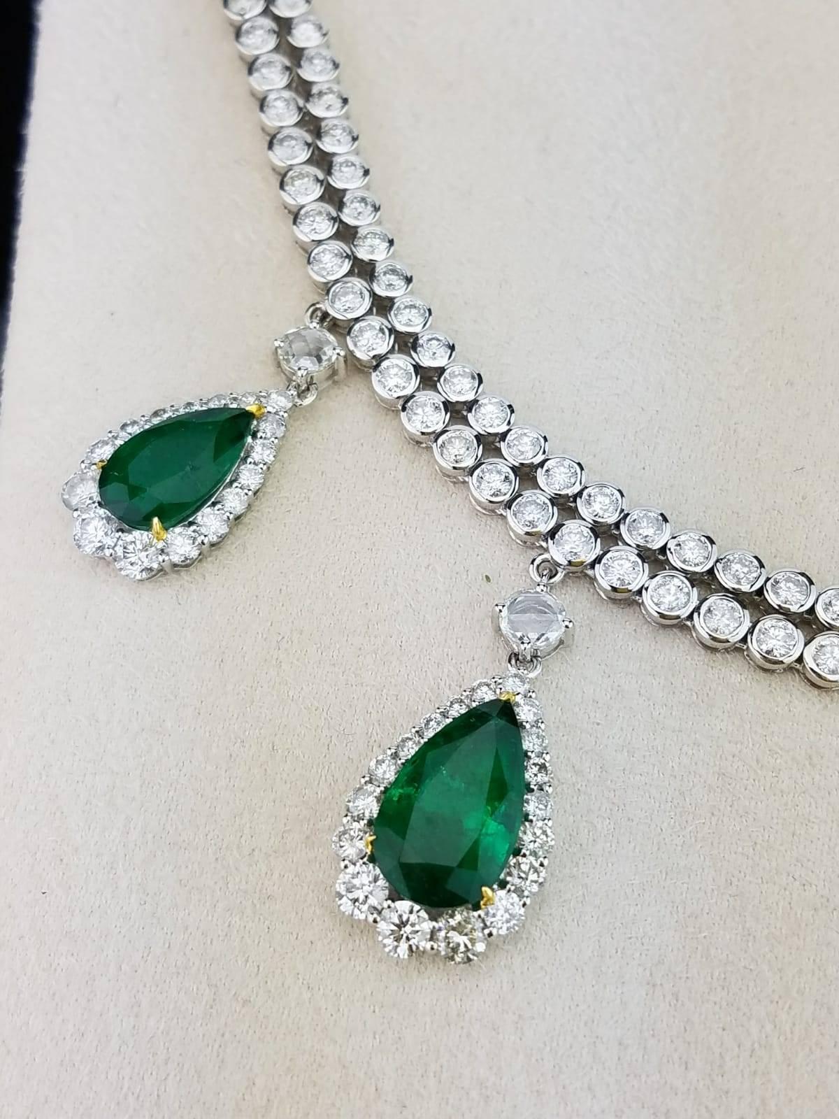 An extremely elegant pear shape Zambian Emeralds and Diamond necklace, all set in 18K white gold. Matching earring and ring can be made to order.

Stone Details:
Stone: Zambian Emerald 
Shape: Pear
Weight:  16.74 carats

Diamond Details:
Weight: