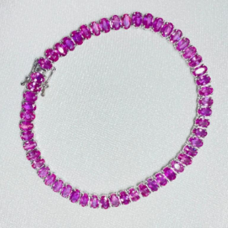Oval Cut 16.75 Carat Natural Pink Sapphire Tennis Bracelet Crafted in 925 Sterling Silver For Sale