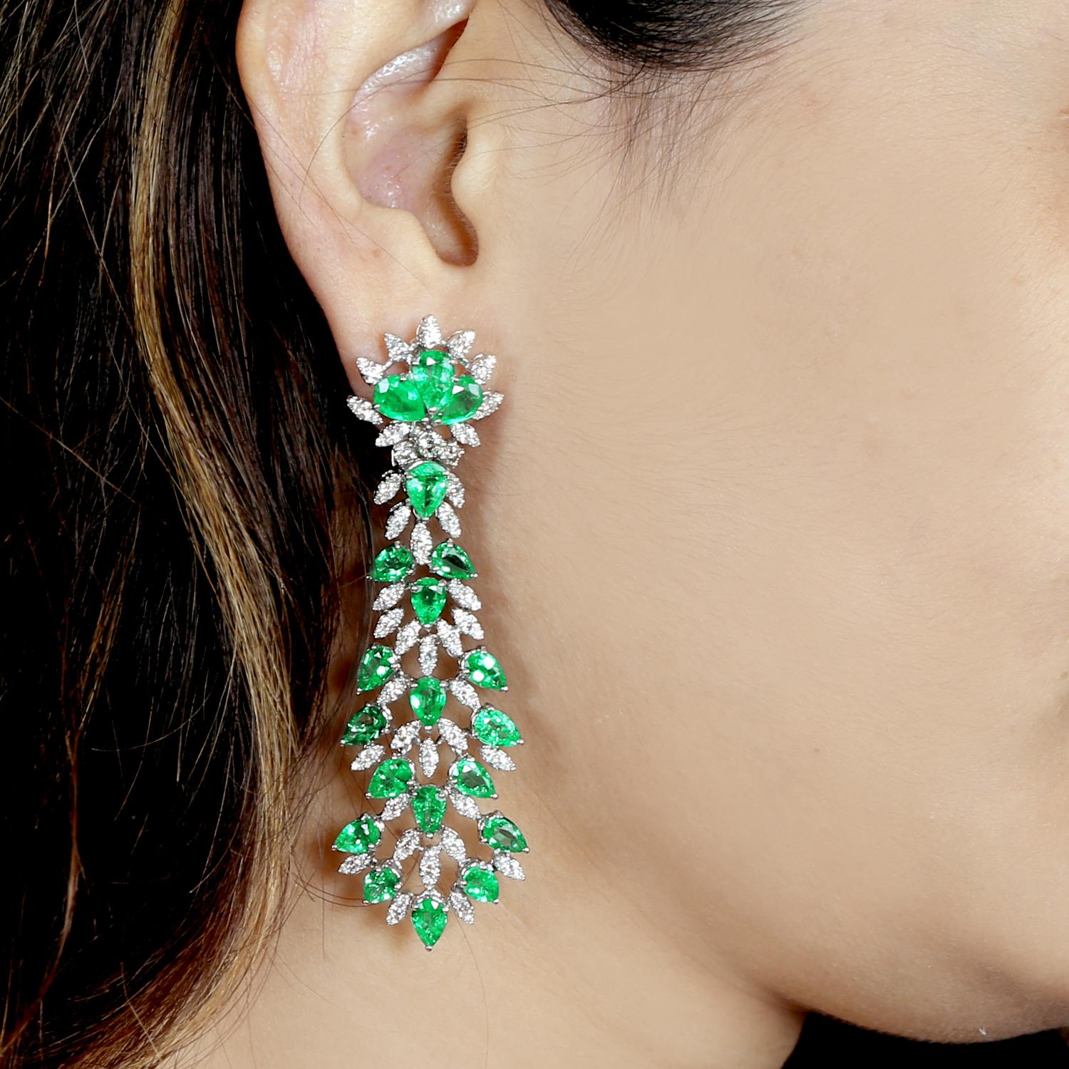 Cast in 14 karat gold, these exquisite earrings are hand set with 16.75 carats emerald and 3.26 carats of glimmering diamonds. 

FOLLOW MEGHNA JEWELS storefront to view the latest collection & exclusive pieces. Meghna Jewels is proudly rated as a