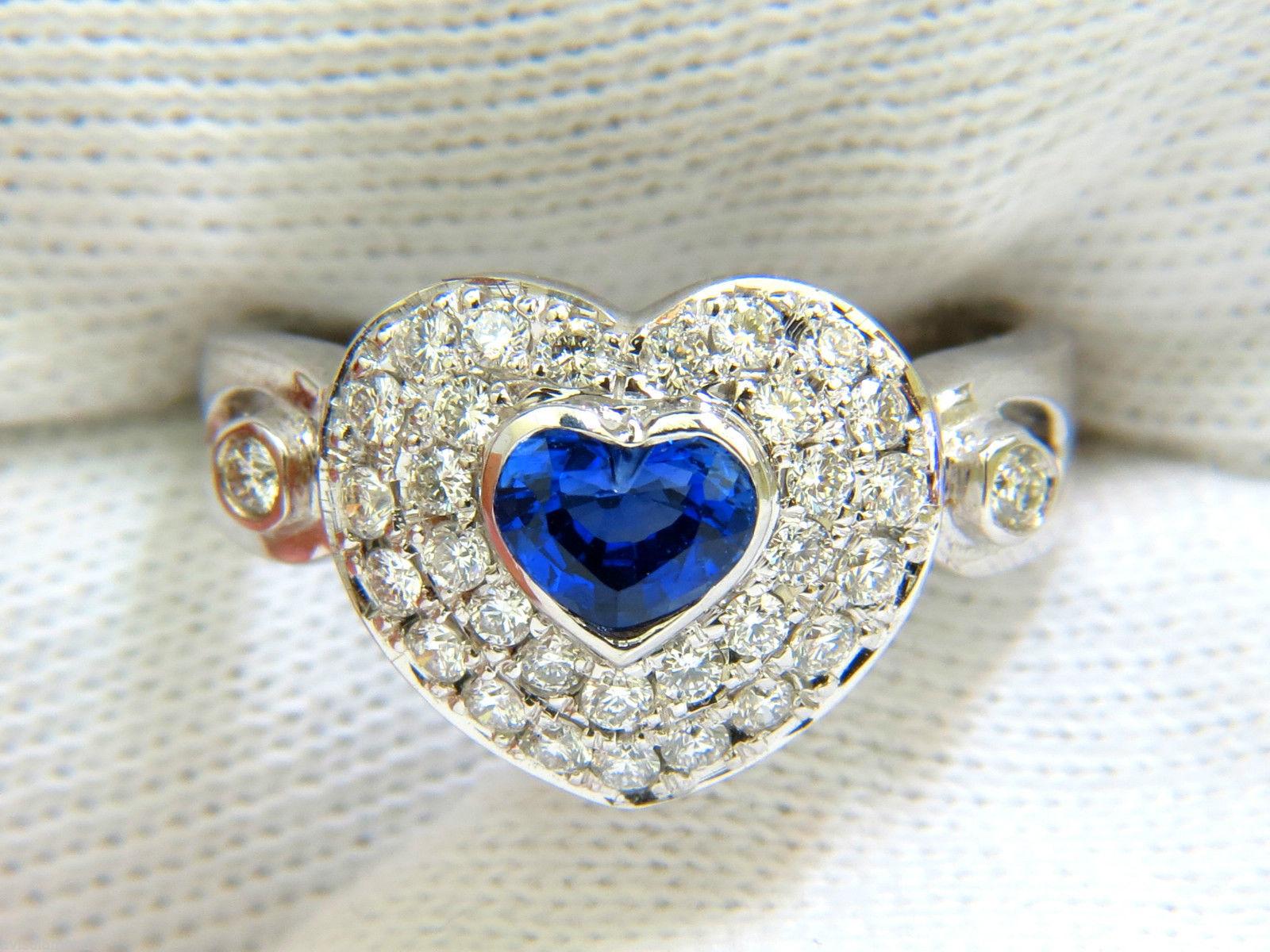 .67ct. Natural Heart shape sapphire
Fine Gem grade

Clean clarity

Full cut, Superb brilliance

Cornflower blue color.

5.4 X 4.4mm



Diamonds around:

1.00ct. & including the (2) diamonds flush set on sides.

Rounds and all full cuts.

F-G color,