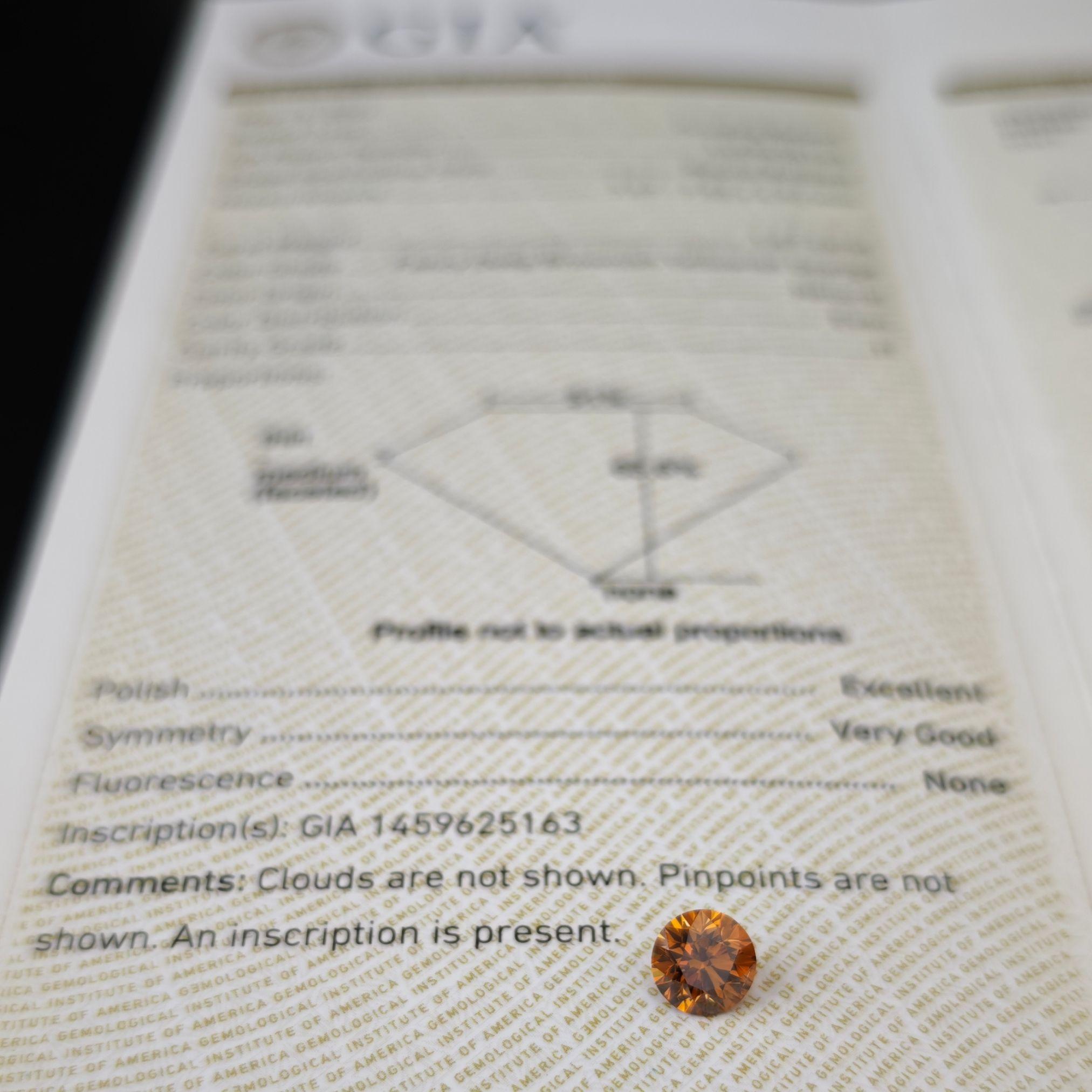 Diamant de 1,67 carat de couleur naturelle jaune-orange brunâtre  Taille ronde Brilliante, GIA en vente 9