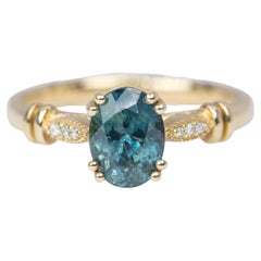 1.67ct Teal Oval Sapphire Vintage Inspired 14K Yellow Gold Engagement Ring
