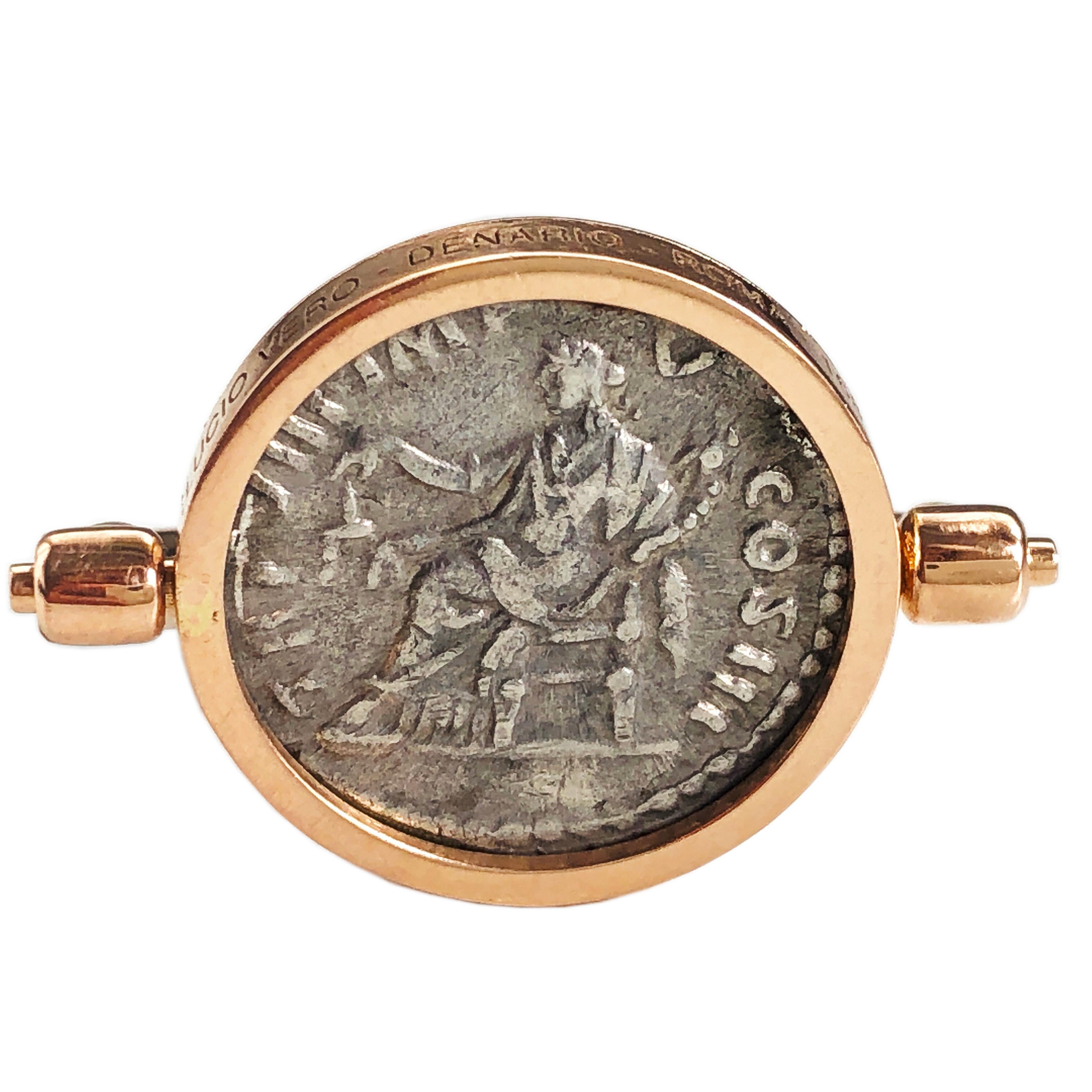 Original and One-of-a-kind 168 A.D. Roman Silver Coin(DENARIO) featuring Emperor Lucio Vero and Dea Aequitas(Justice) on the back in an 18Kt Yellow Gold Setting. Emperor's Name and Coinage Date are Engraved on the Coin's Setting.
Lucio Vero reigned