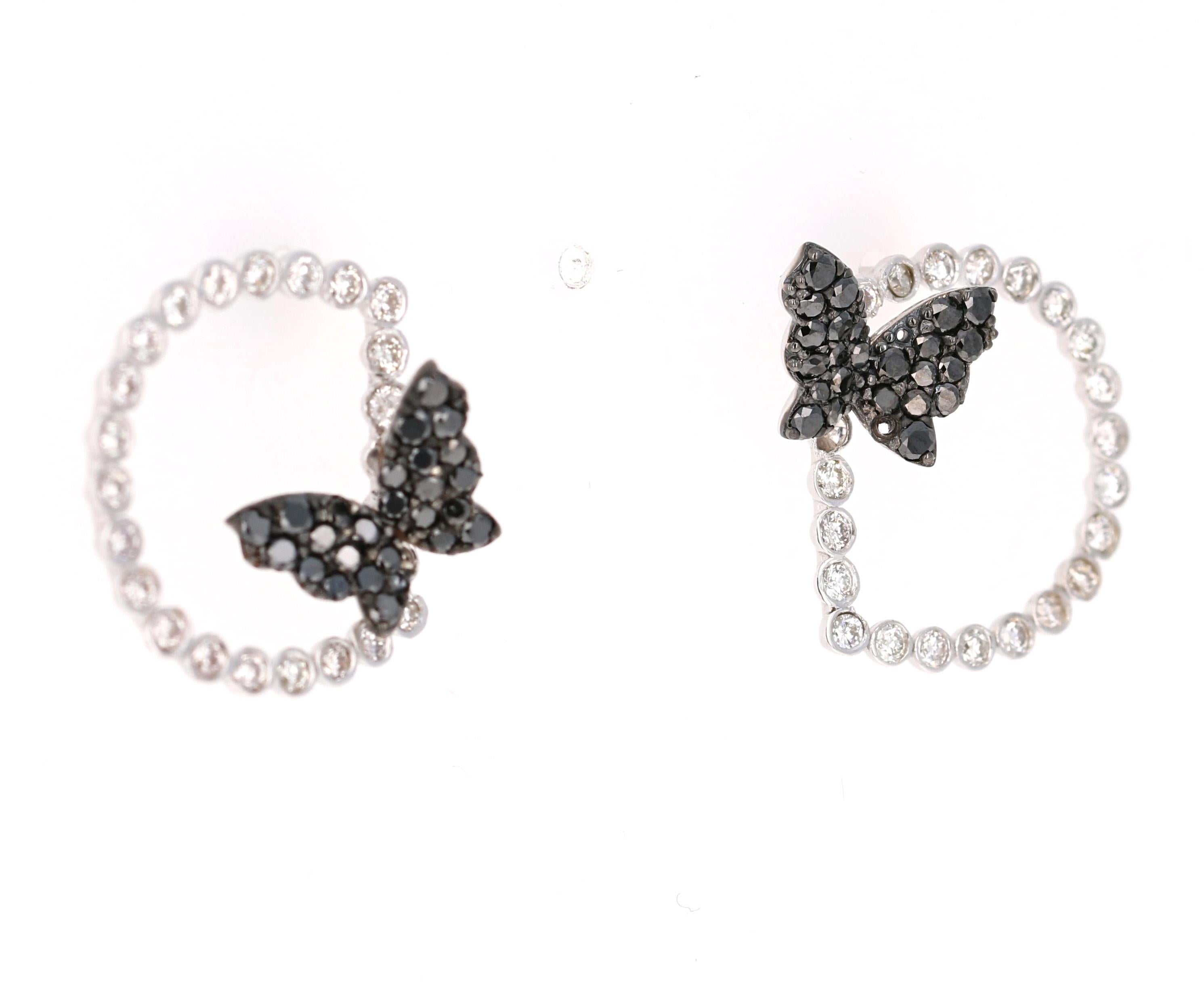 1.68 Carat Black Diamond Butterfly 14 Karat White Gold Earrings

Beautiful Black Diamond and White Diamond Butterfly Earrings in 14K White Gold.  This design has 46 Round Cut Diamonds that weigh 0.83 carats (Clarity: VS2, Color: H) and 52 Black