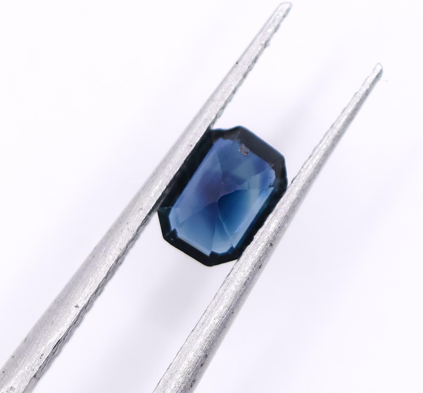 Modern 1.68 Carat Blue Sapphire Loose Gemstone Emerald cut 6x4mm For Sale