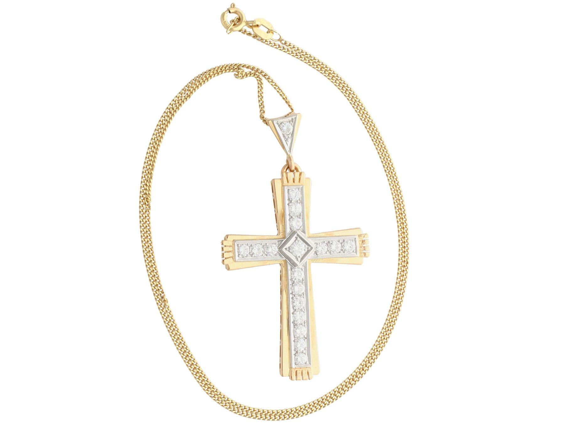 A stunning, fine and impressive Belgium vintage 1.68 carat diamond and 18 karat yellow gold, 18 karat white gold cross pendant; part of our diverse diamond estate jewelry collections.

This fine and impressive vintage diamond pendant has been