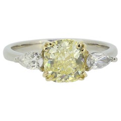 1.68 Carat Fancy Yellow Cushion-Cut Diamond Three-Stone Ring