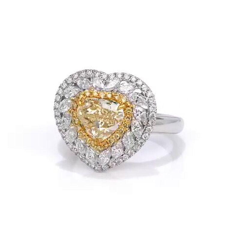 Contemporary 1.68 Carat Fancy Yellow Heart Shape Diamond Halo Engagement Ring For Sale