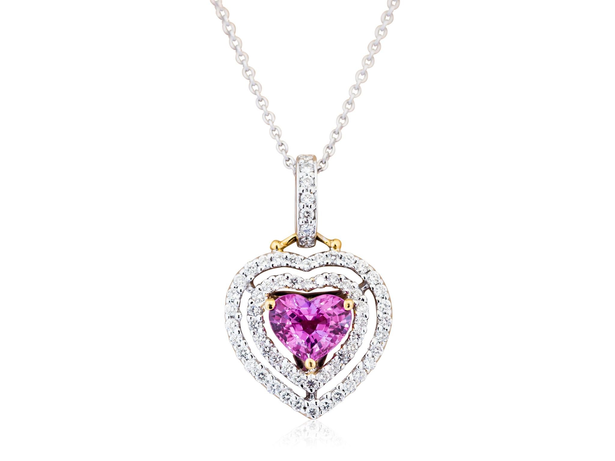 1.68 Carat Heart Pink Sapphire Diamond Pendant, framed with a double halo of full cut diamonds.