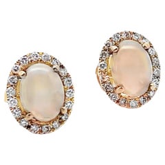 1.68 Carat Oval Opal Stud Earrings with Round Diamonds in 14K Yellow Gold