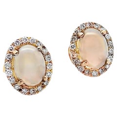 1.68 Carat Oval Opal Stud Earrings with Round Diamonds in 14K Yellow Gold